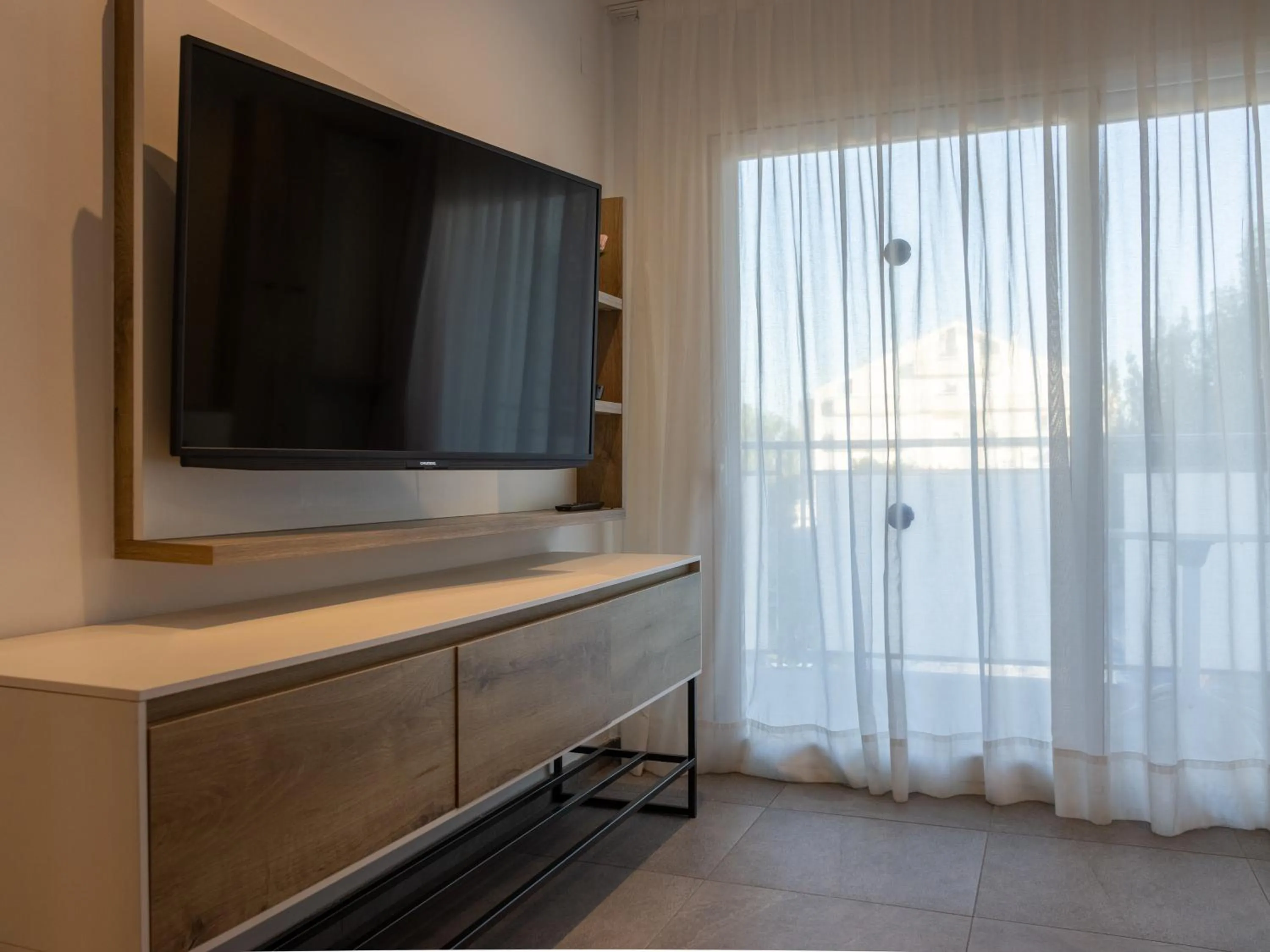 TV and multimedia in Apartamentos Sunway Apollo