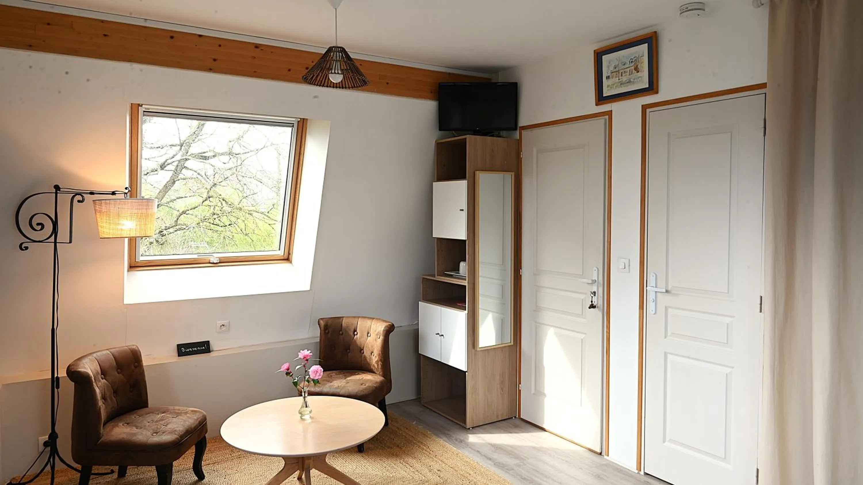 Communal lounge/ TV room in La Petite Charnasserie