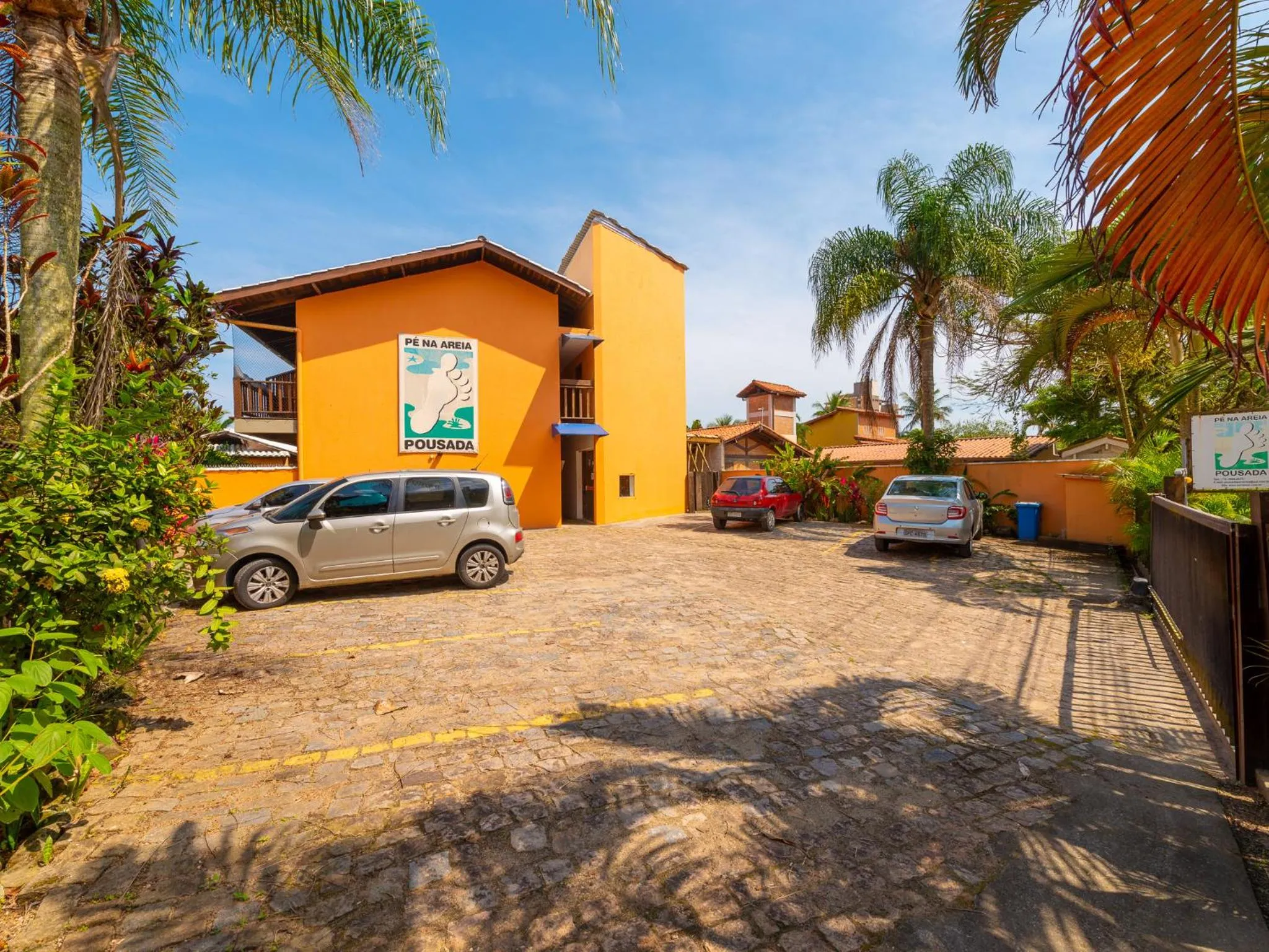 Property logo or sign in Pousada Pé Na Areia