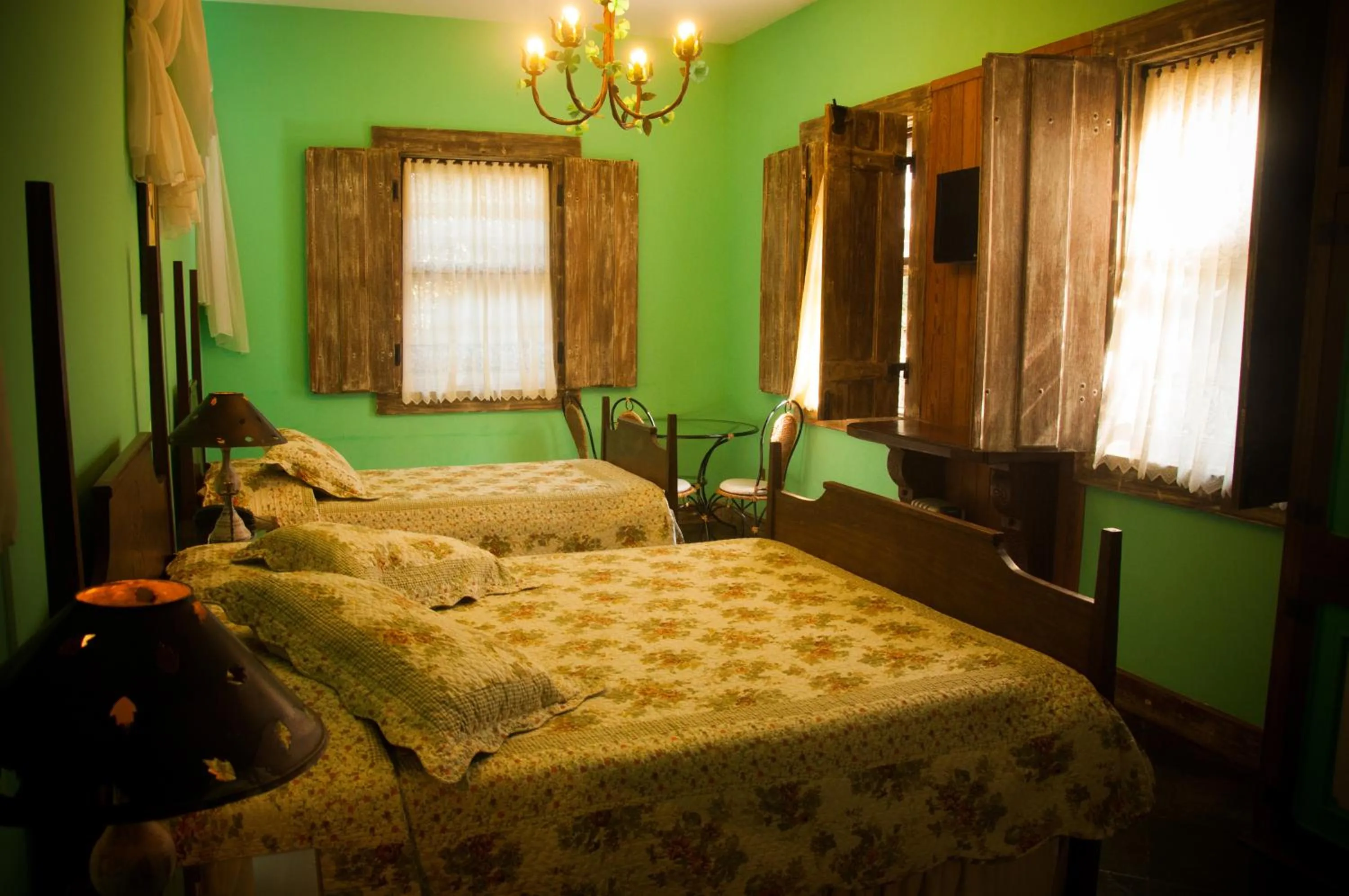 Photo of the whole room, Bed in Pousada Xica da Silva