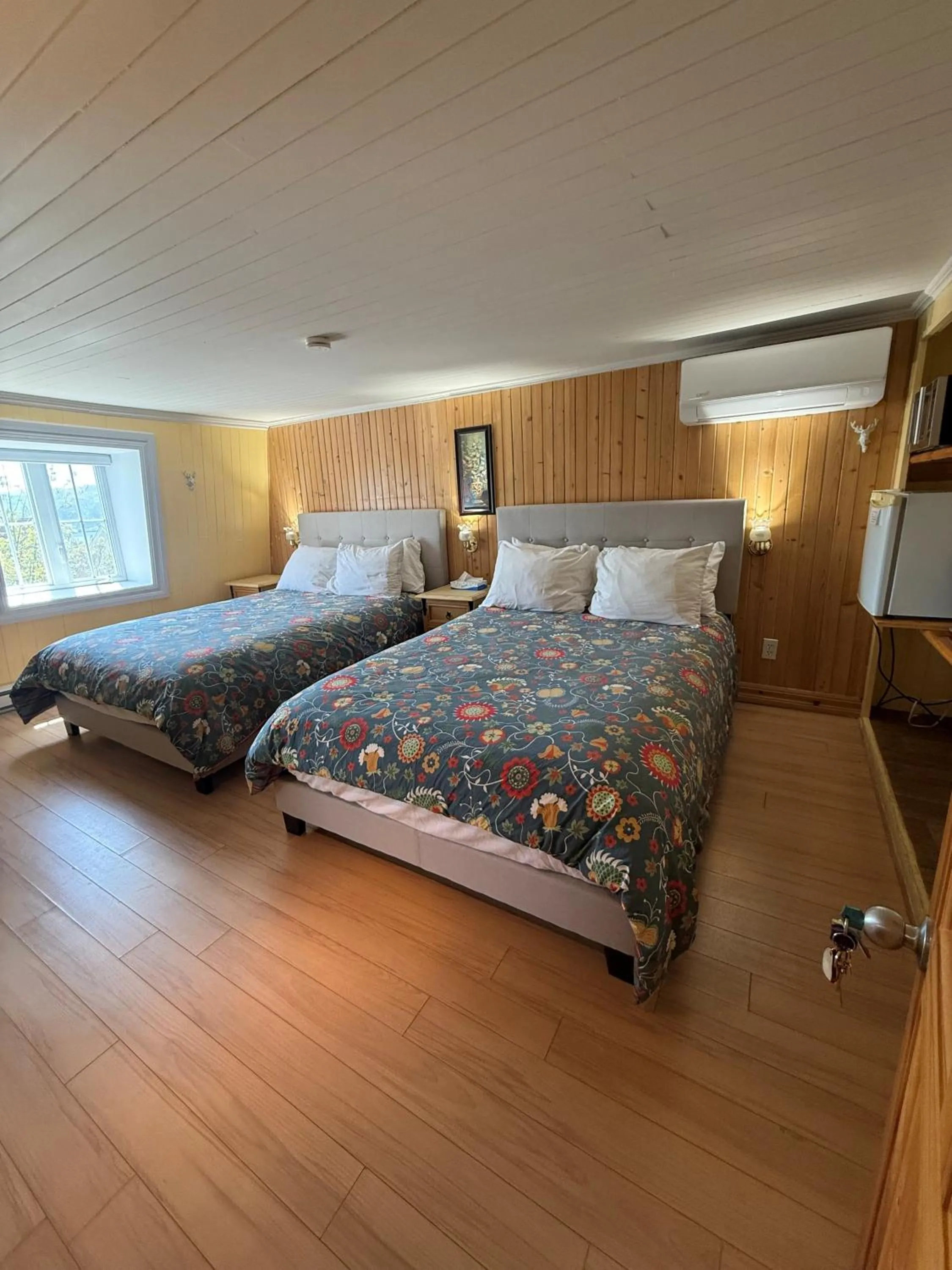 Bed in La Galouine Auberge