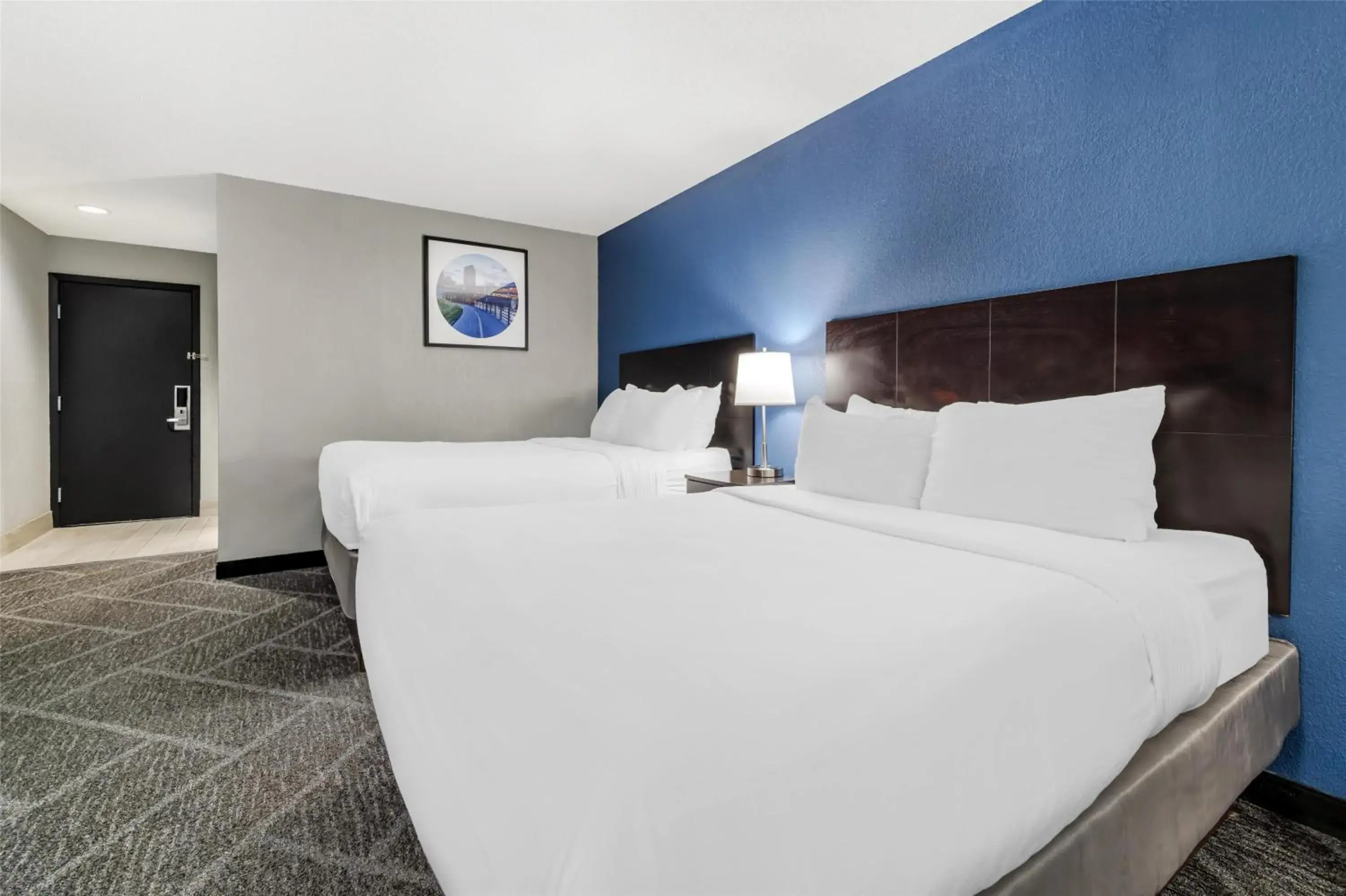 Queen Room with Two Queen Beds and Word Desk - Pool View in Best Western Rochester Hotel Mayo Clinic Area/ St. Mary's Queen Room with Two Queen Beds and Word Desk - Pool View in Best Western Rochester Hotel Mayo Clinic Area/ St. Mary's