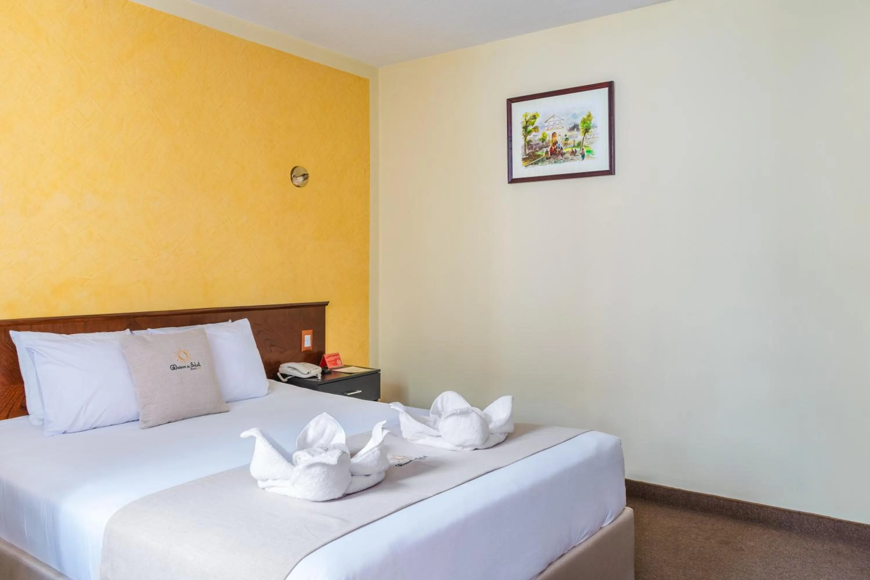 Bed in Hotel Maison Du Solei