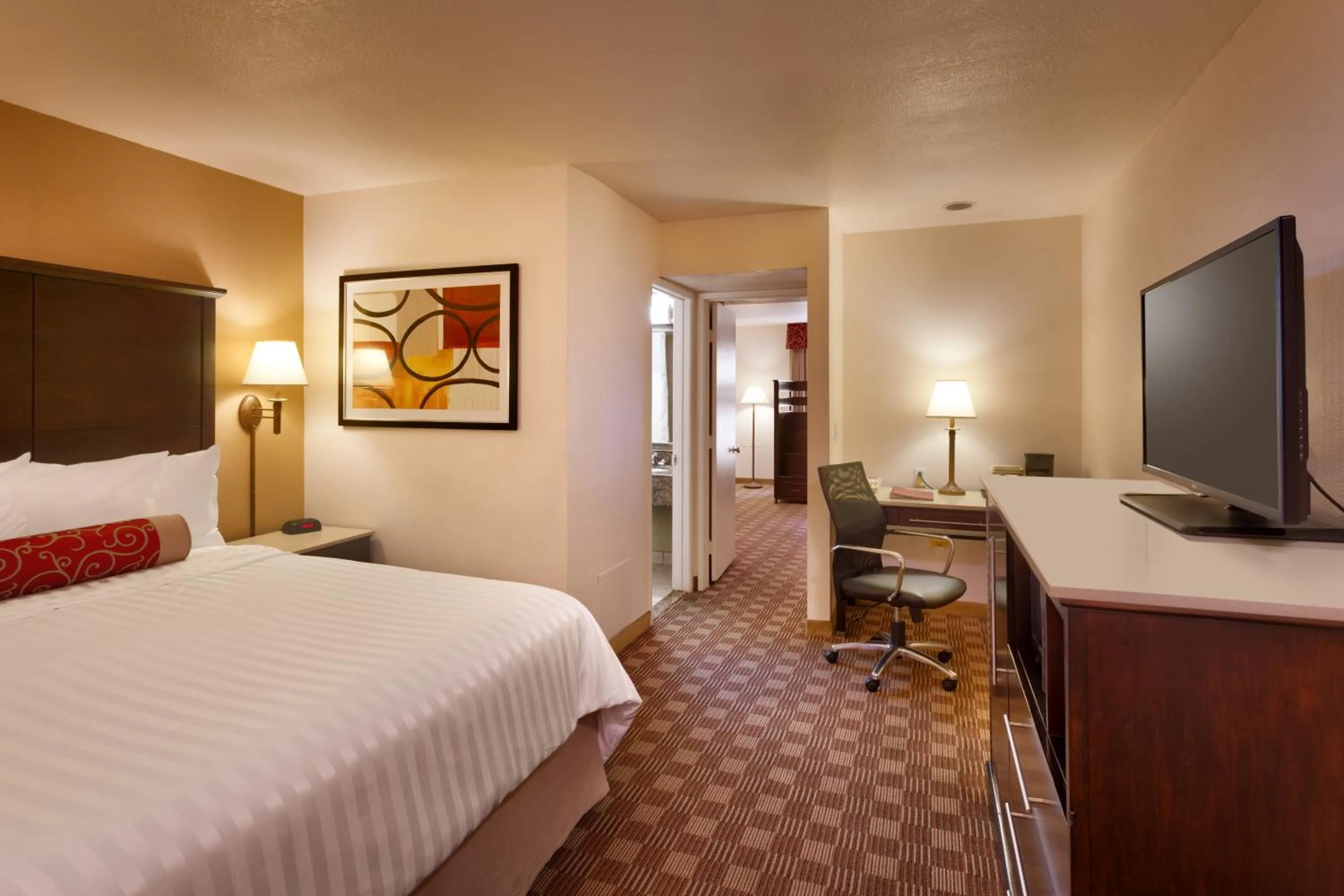 Bed in Cortona Inn and Suites Anaheim Resort
