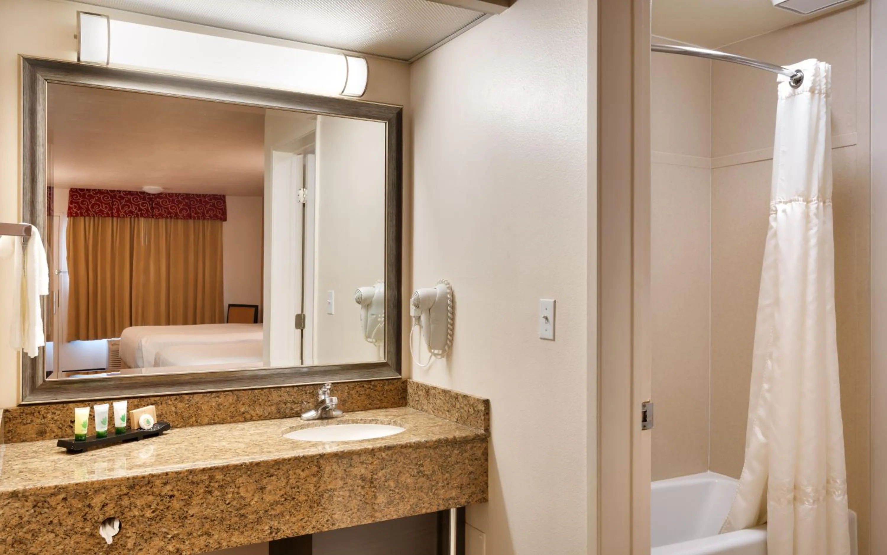 Bathroom in Cortona Inn and Suites Anaheim Resort