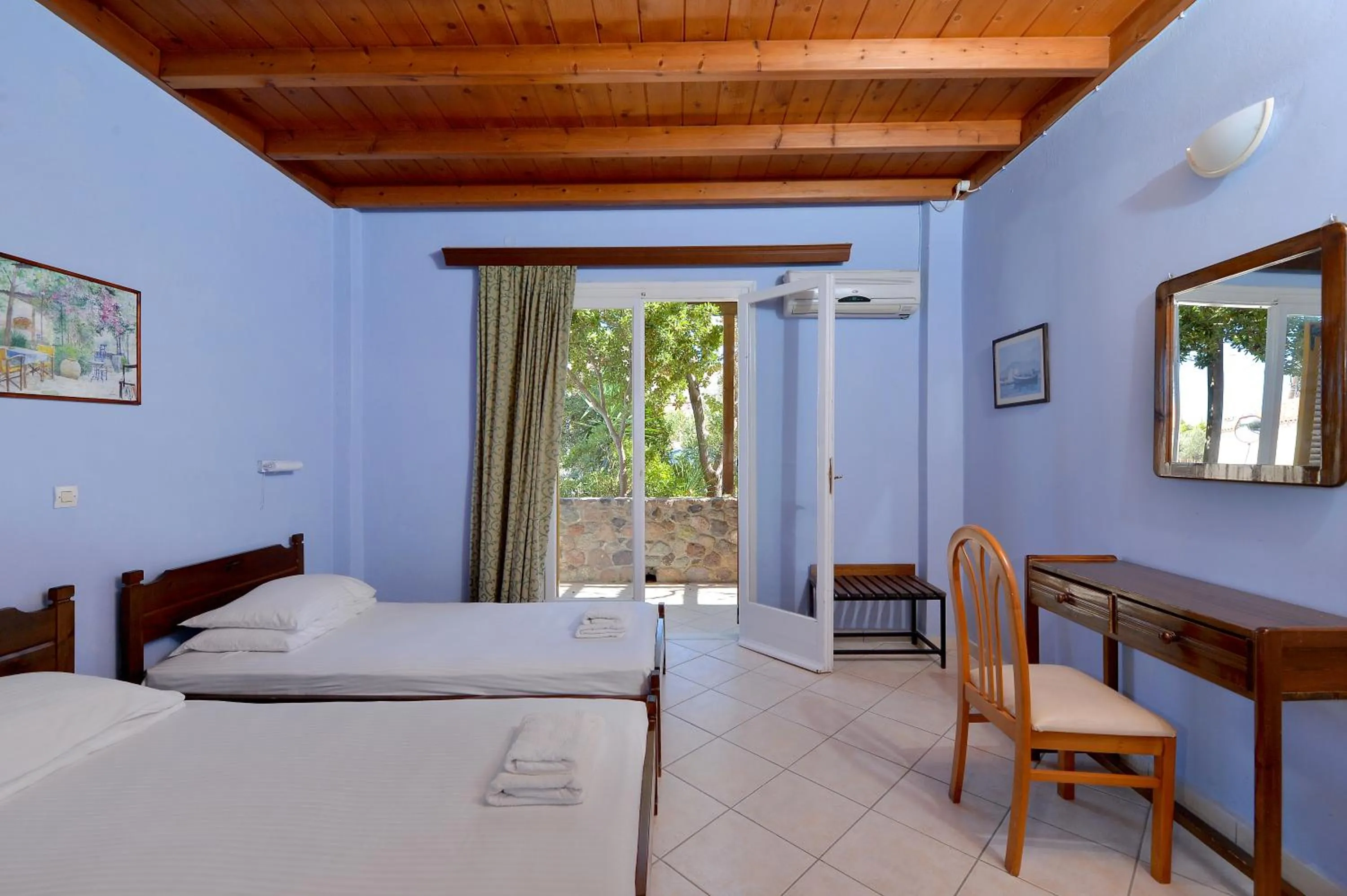 Bed in Vagia Beach Apartments, Aegina Island