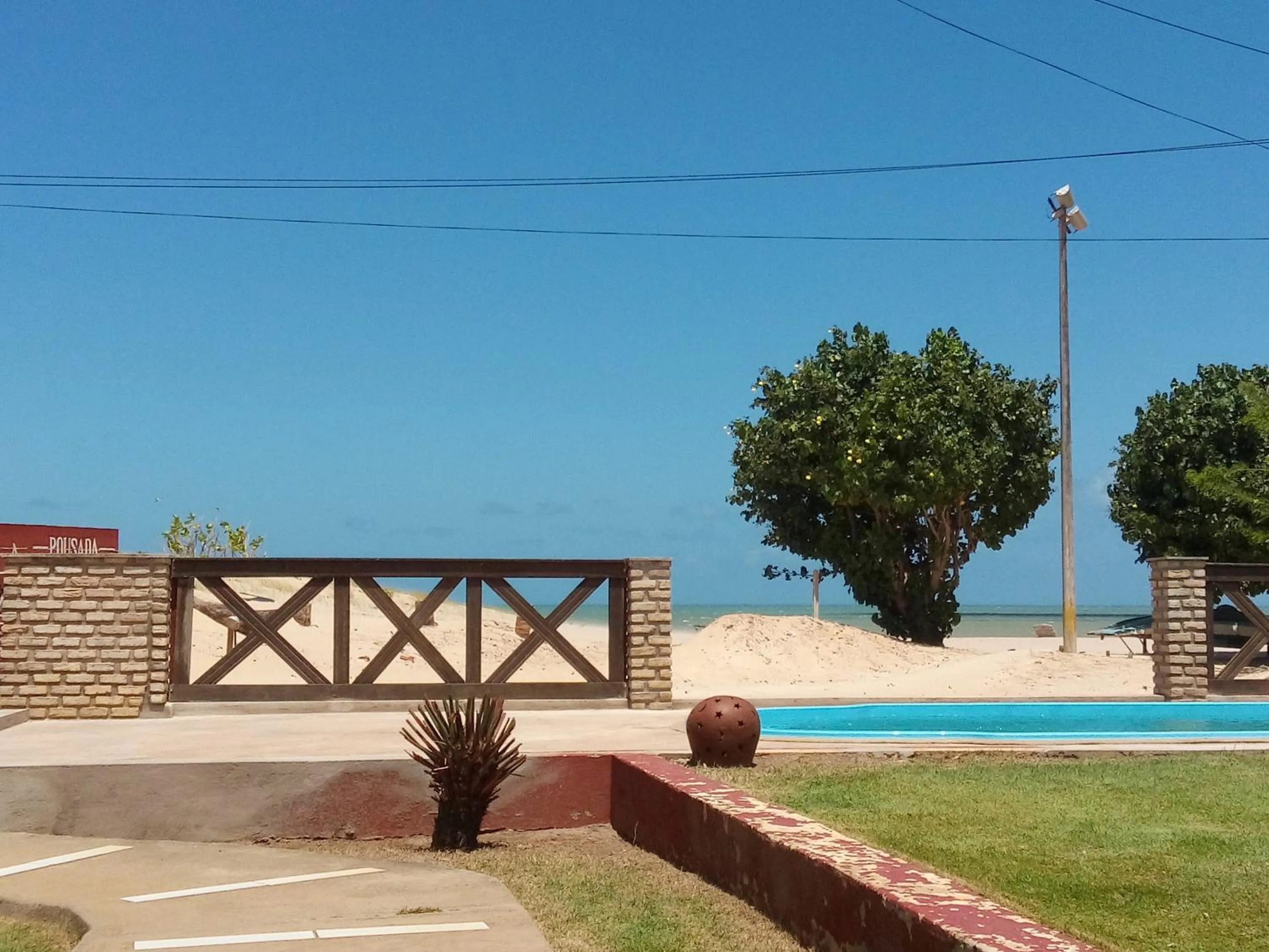 Pool view in Pousada Arte do Velejo by Solarium