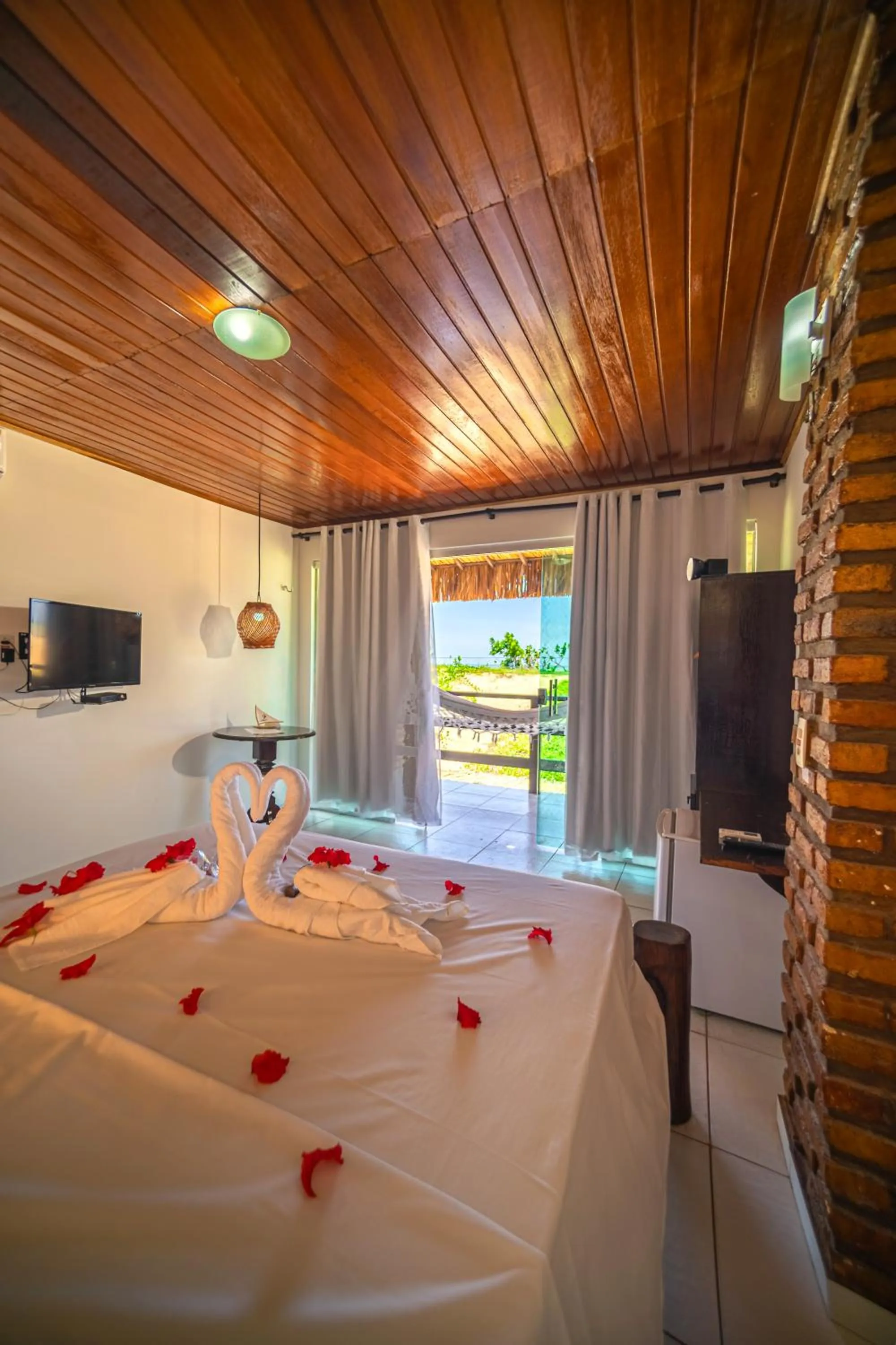 Bed in Pousada Arte do Velejo by Solarium