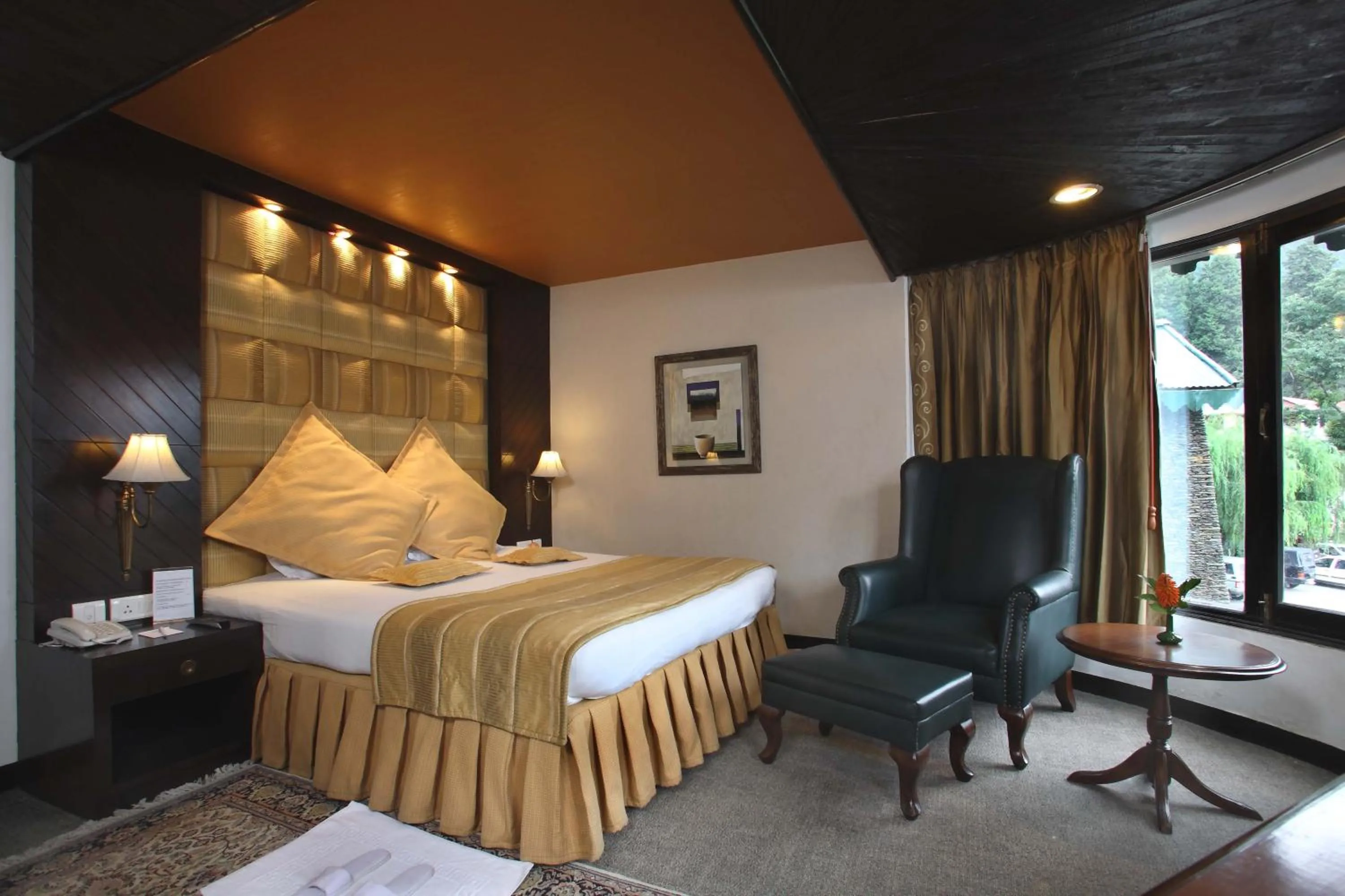 Bed in Shervani Hilltop Resort