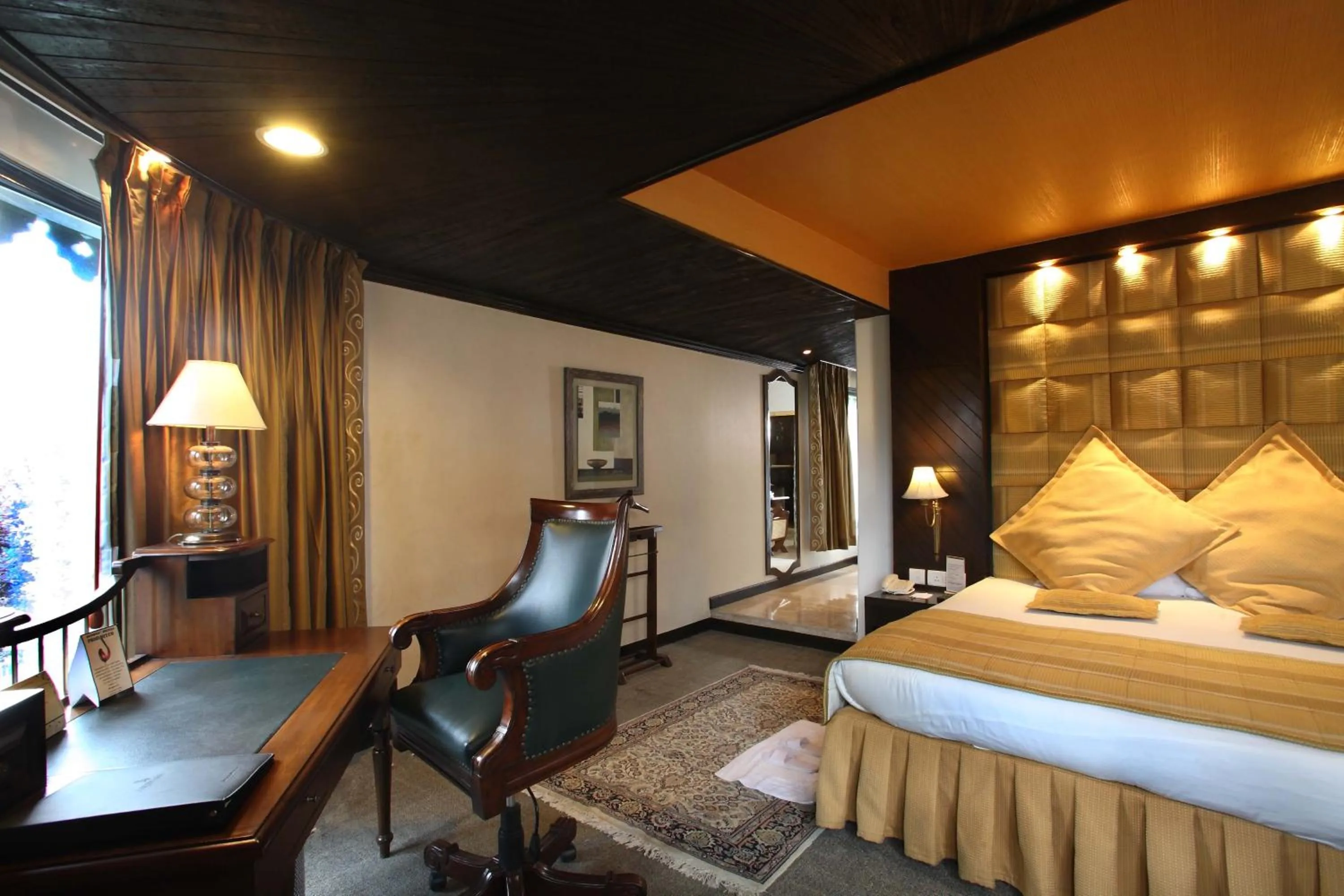 Bed in Shervani Hilltop Resort