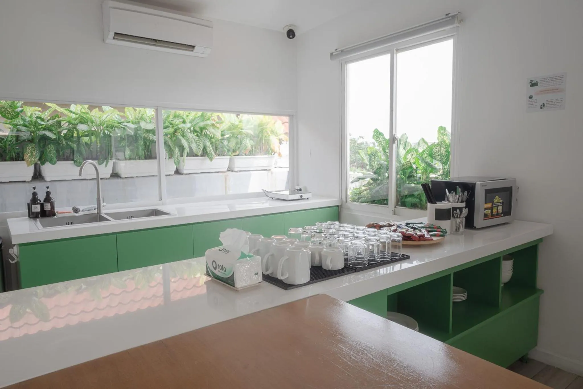 Communal kitchen in Common Inn Thao Dien