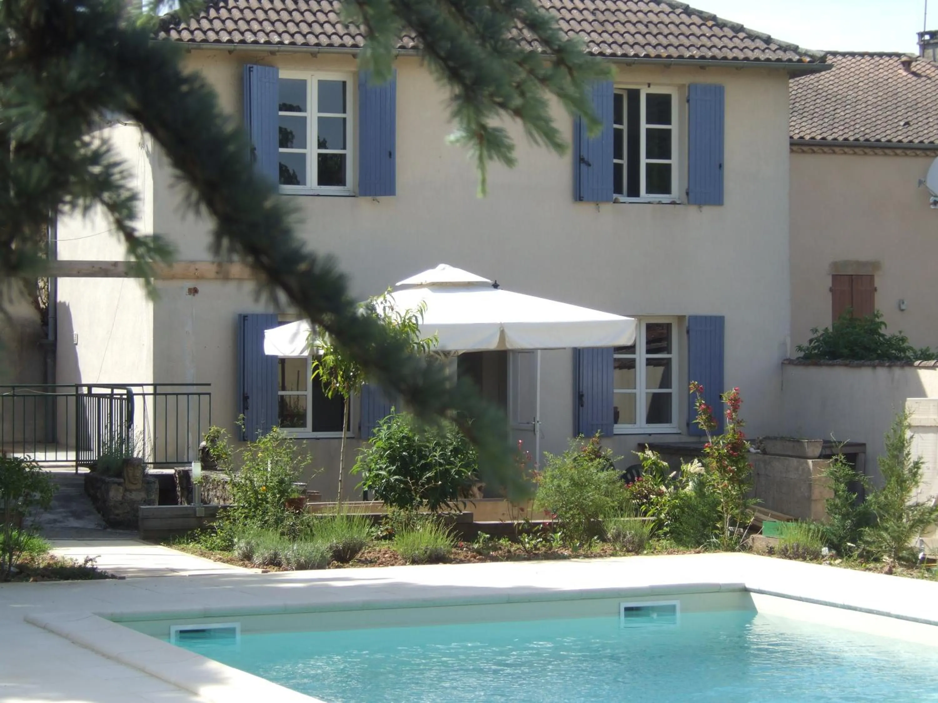 Garden in Logis Hôtel Restaurant La Bastide