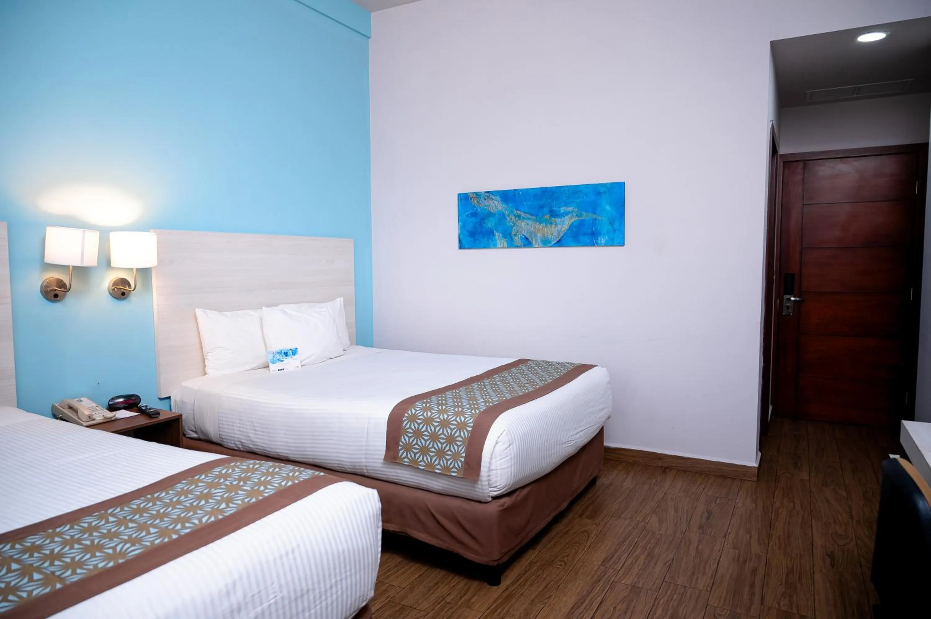Bed in Comfort Inn & Suites Los Cabos