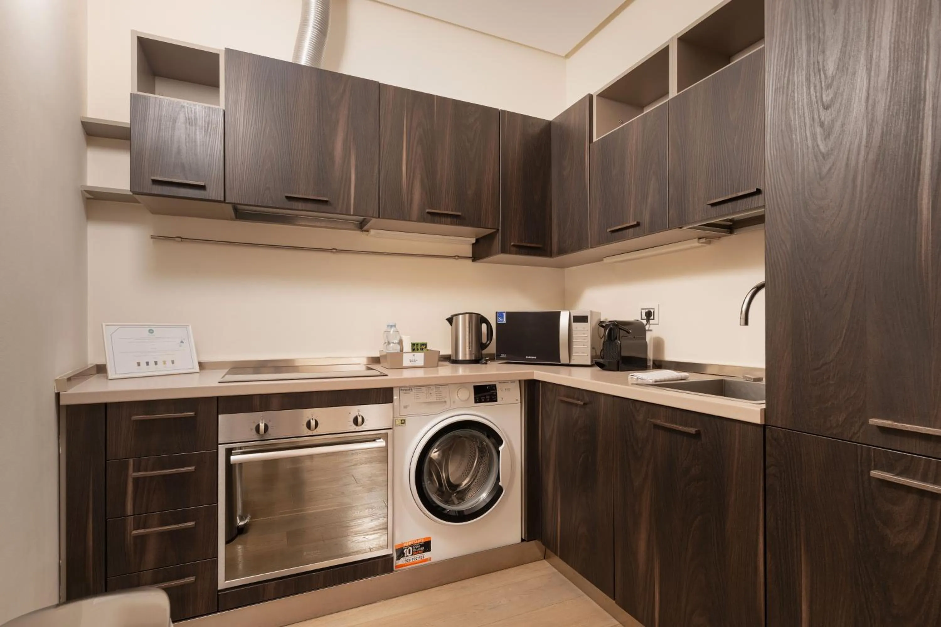 Kitchen or kitchenette in Brera Apartments in City Center