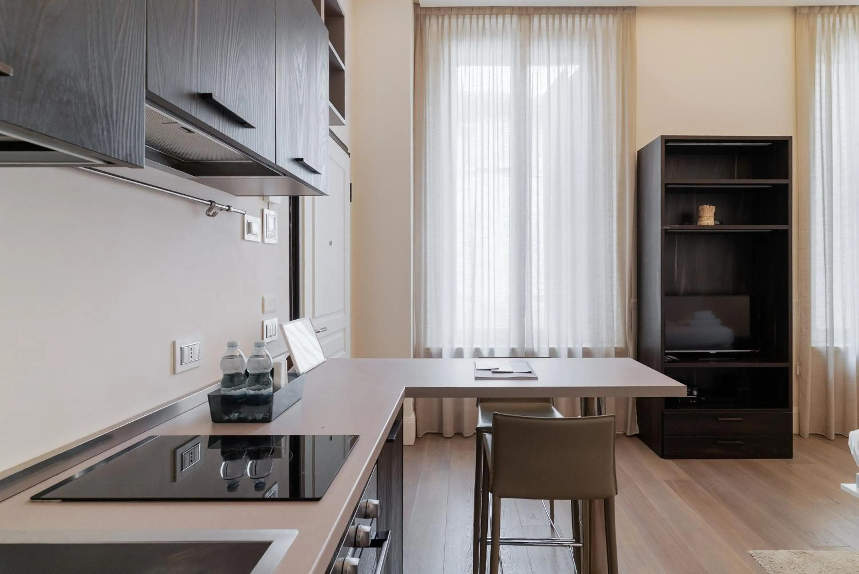 Kitchen or kitchenette in Brera Apartments in City Center