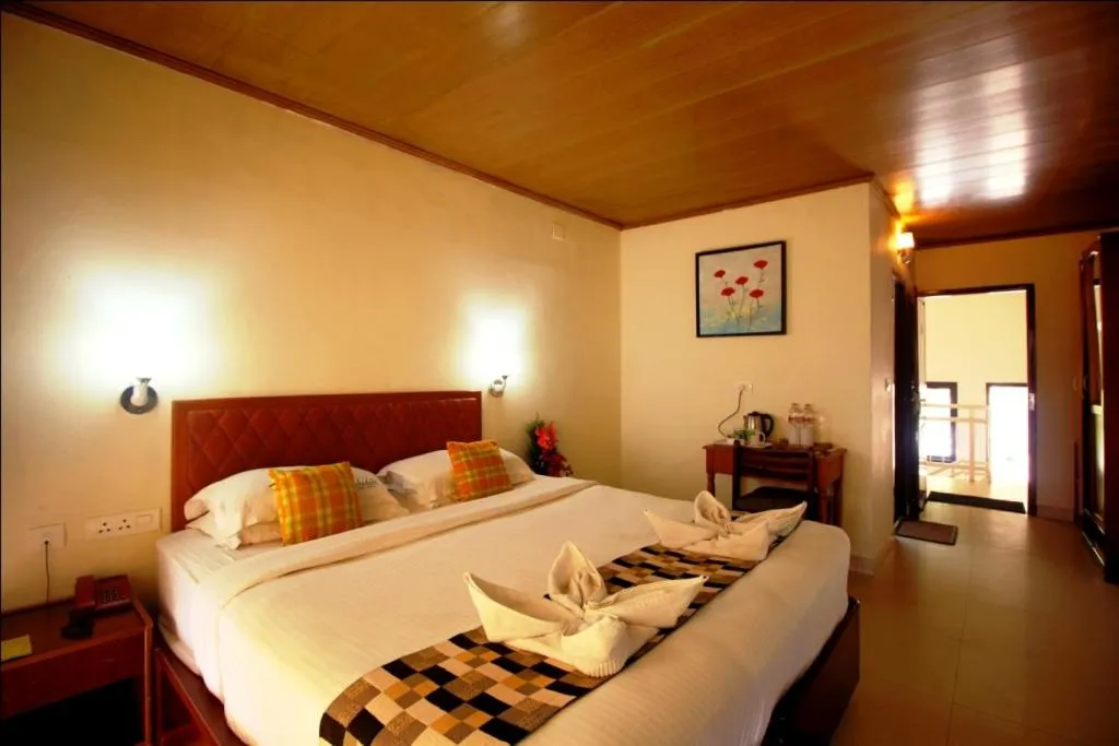 Bed in Deshadan Mountain Resort -The highest resort in Munnar
