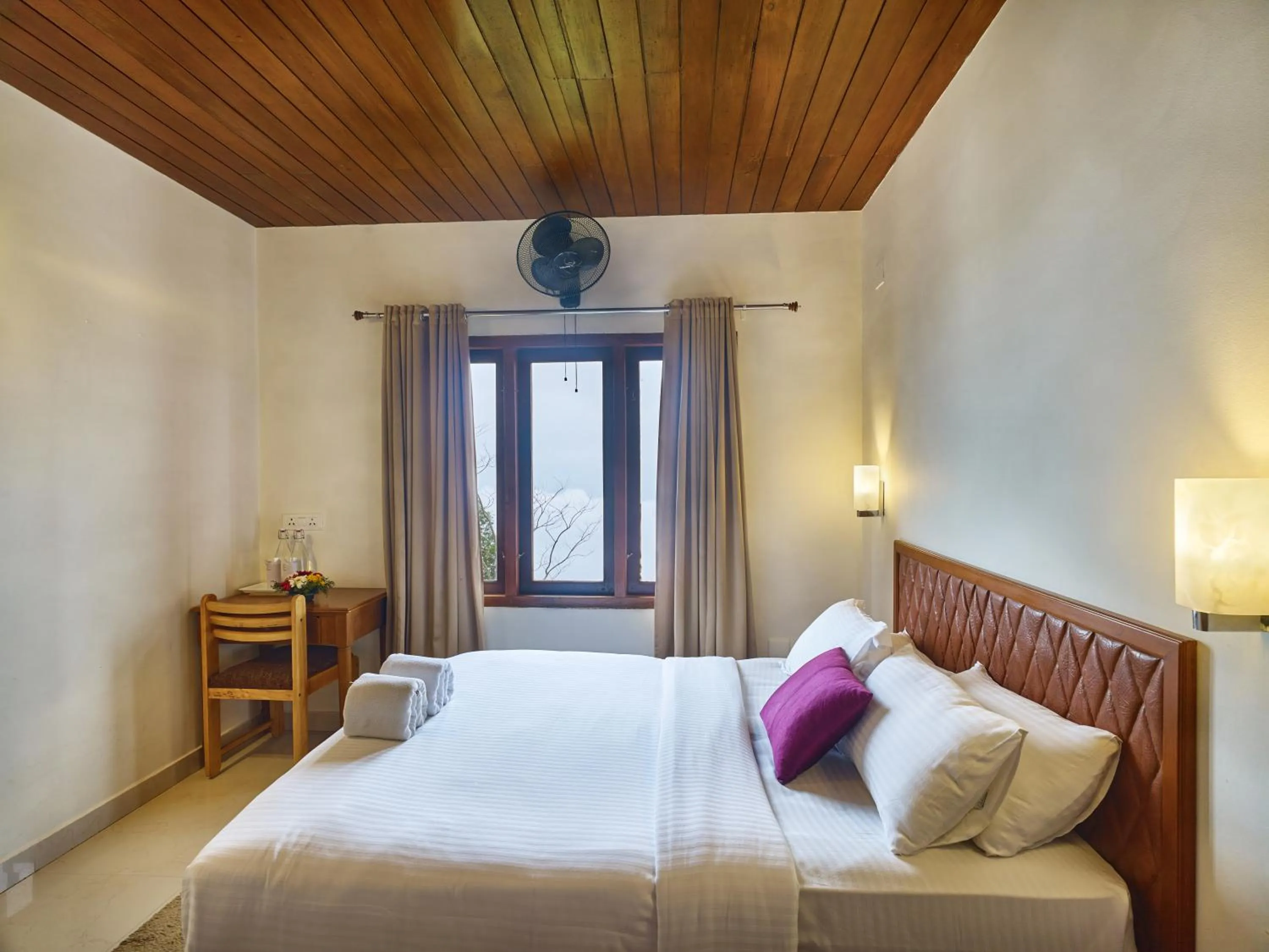 Bed in Deshadan Mountain Resort -The highest resort in Munnar