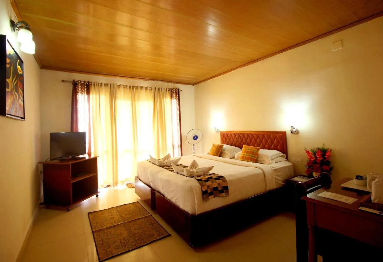 Bed in Deshadan Mountain Resort -The highest resort in Munnar