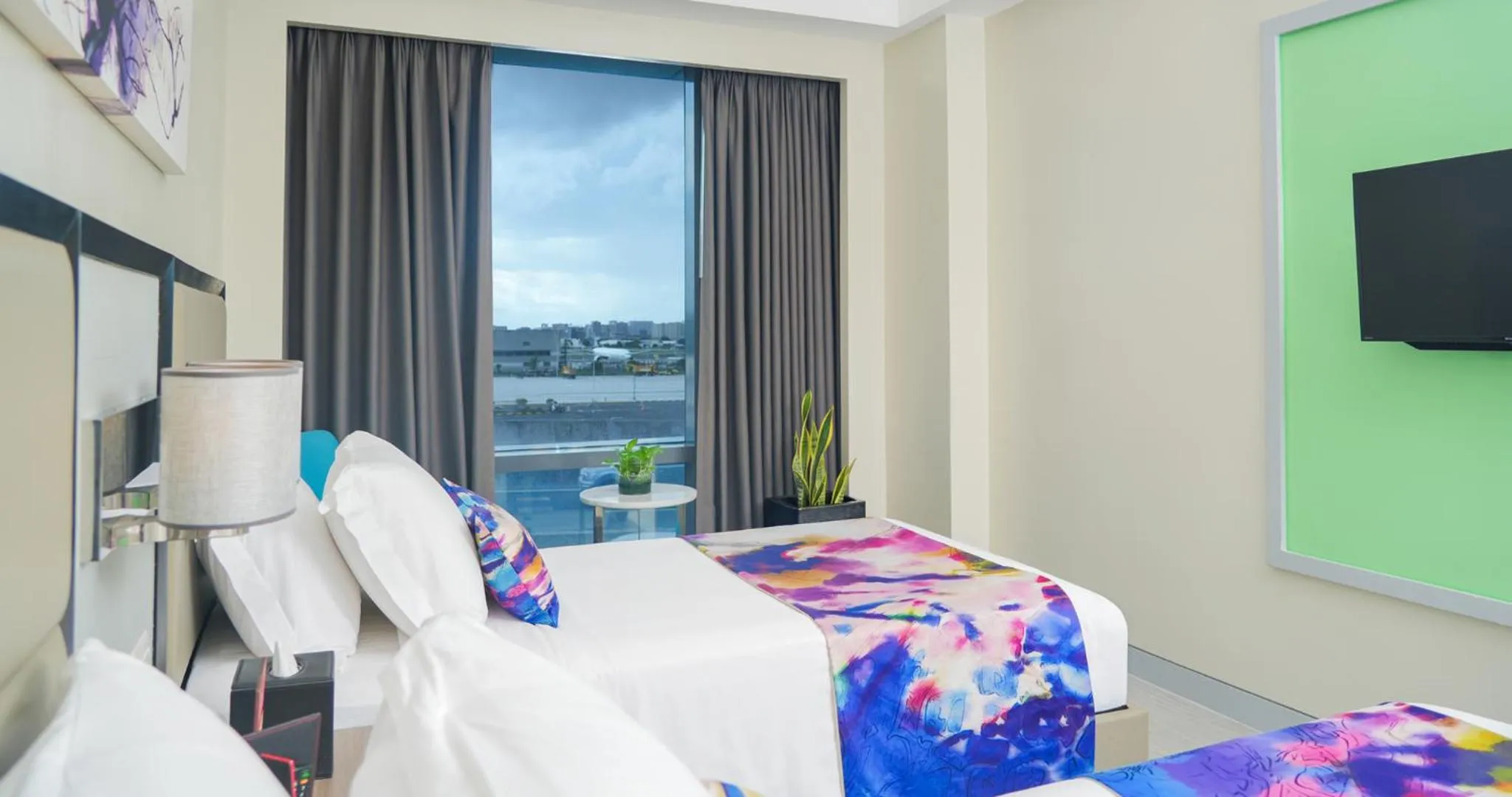 Bed in Savoy Hotel Manila near Airport NAIA Terminal 3 MNL