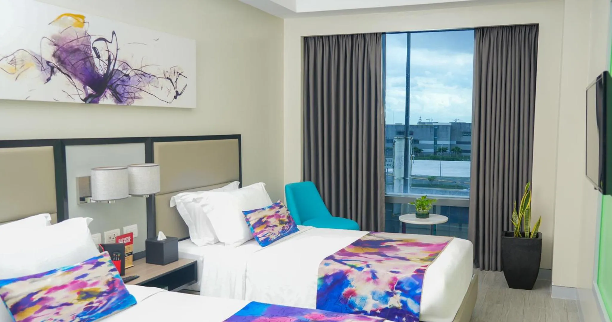 Bed in Savoy Hotel Manila near Airport NAIA Terminal 3 MNL