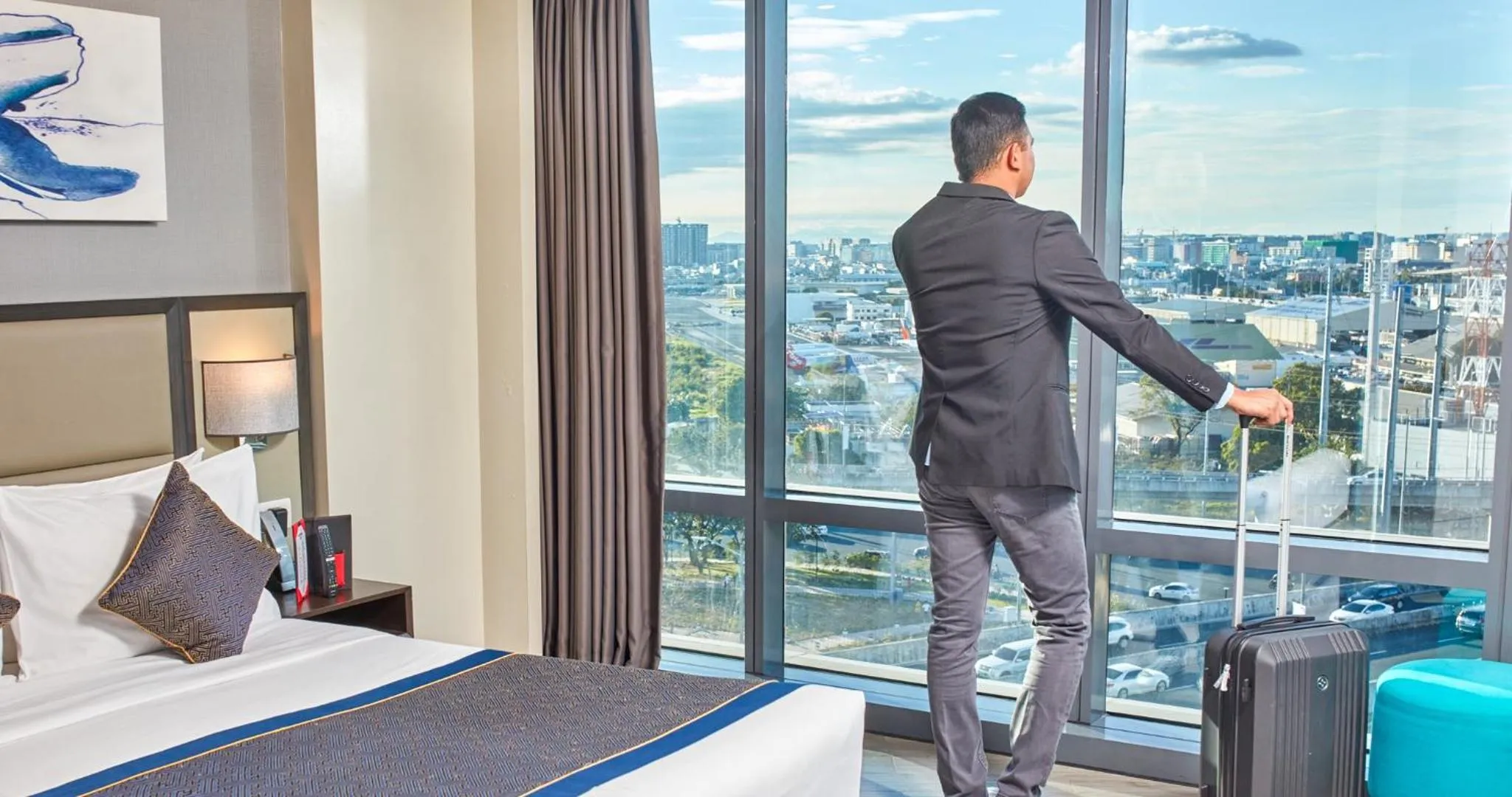 View (from property/room), Bed in Savoy Hotel Manila near Airport NAIA Terminal 3 MNL