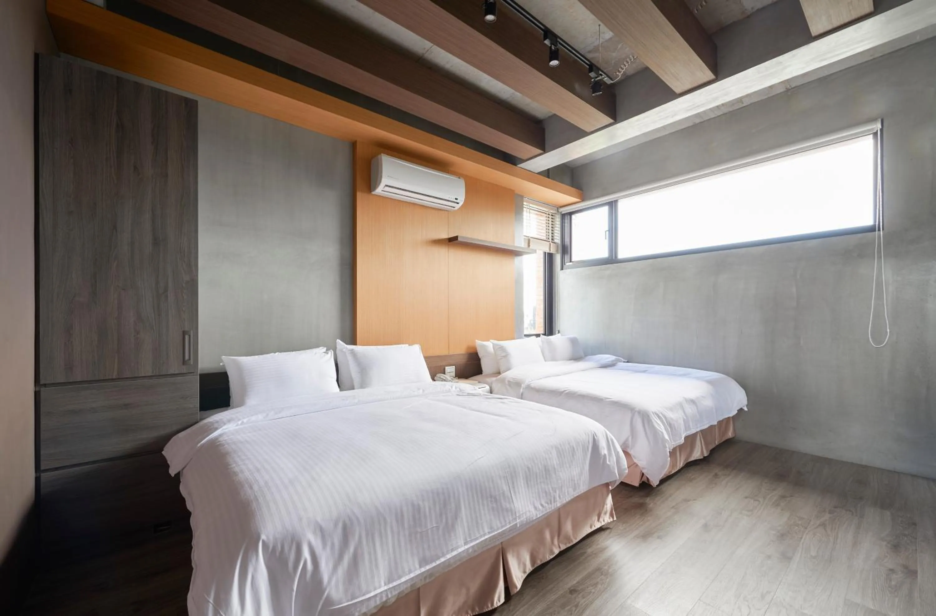 Bed in Enjoy Sanheyuan