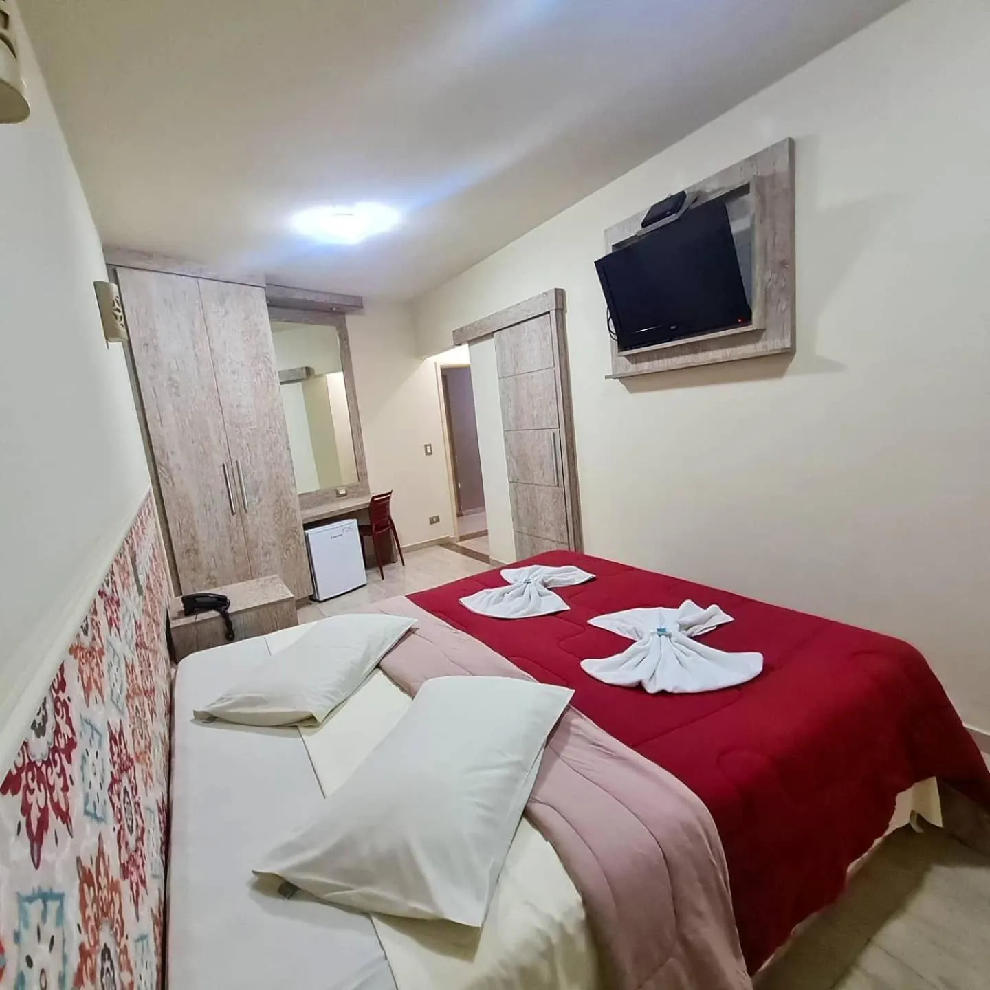 Photo of the whole room, Bed in NC Hotel