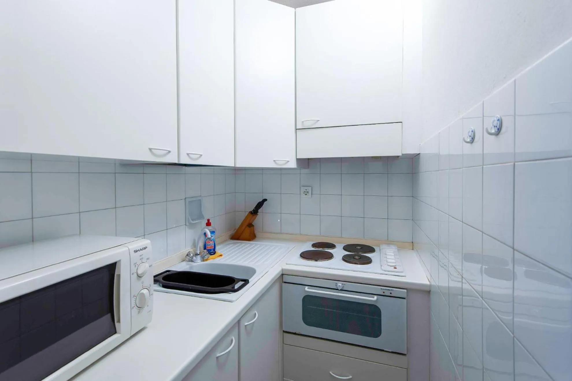 Kitchen or kitchenette in Velòra ex Hotel Venezia