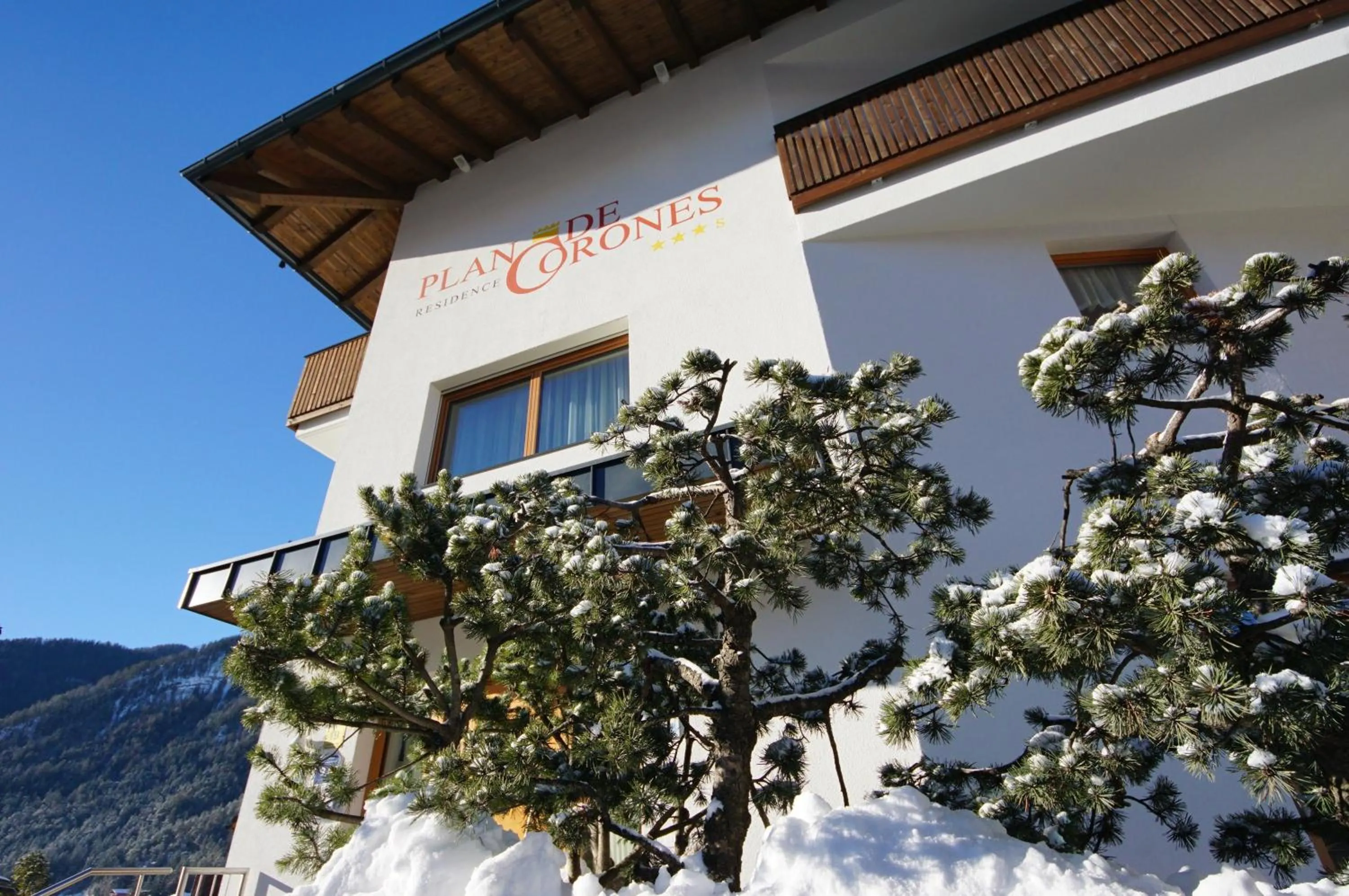 Property logo or sign in Residence Plan De Corones