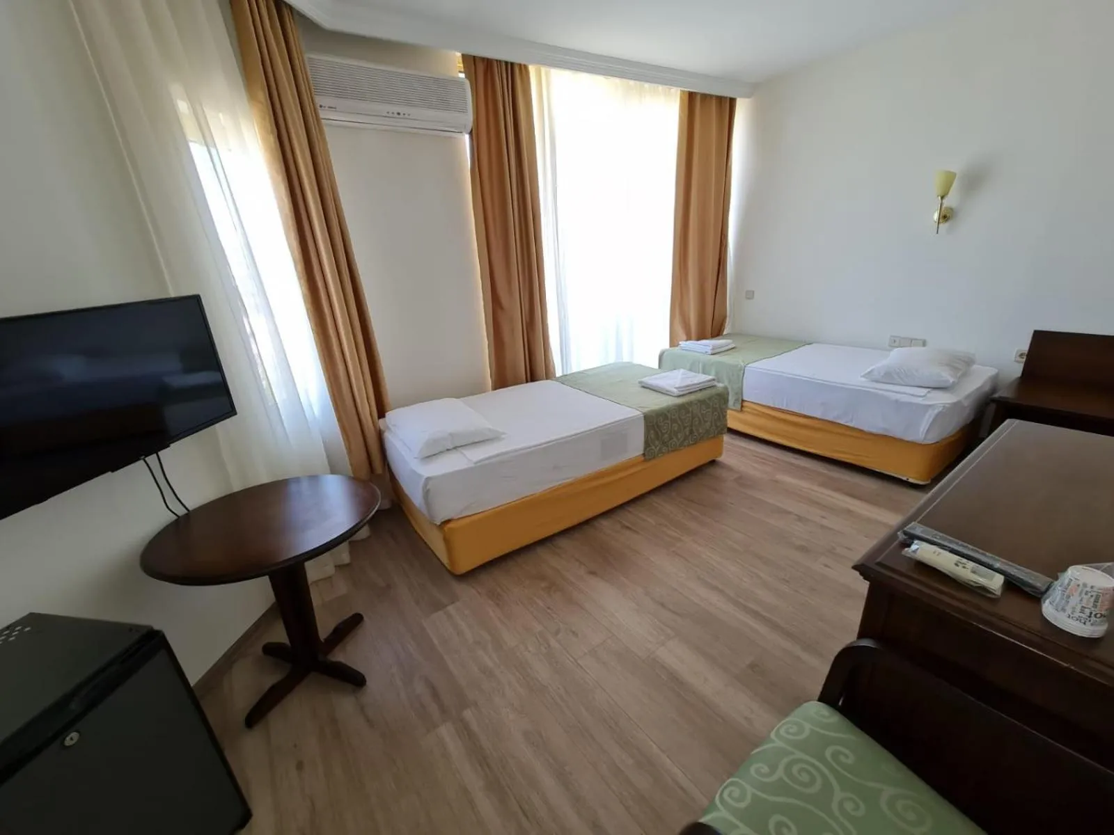 Bed in Side Palm D'or Hotel