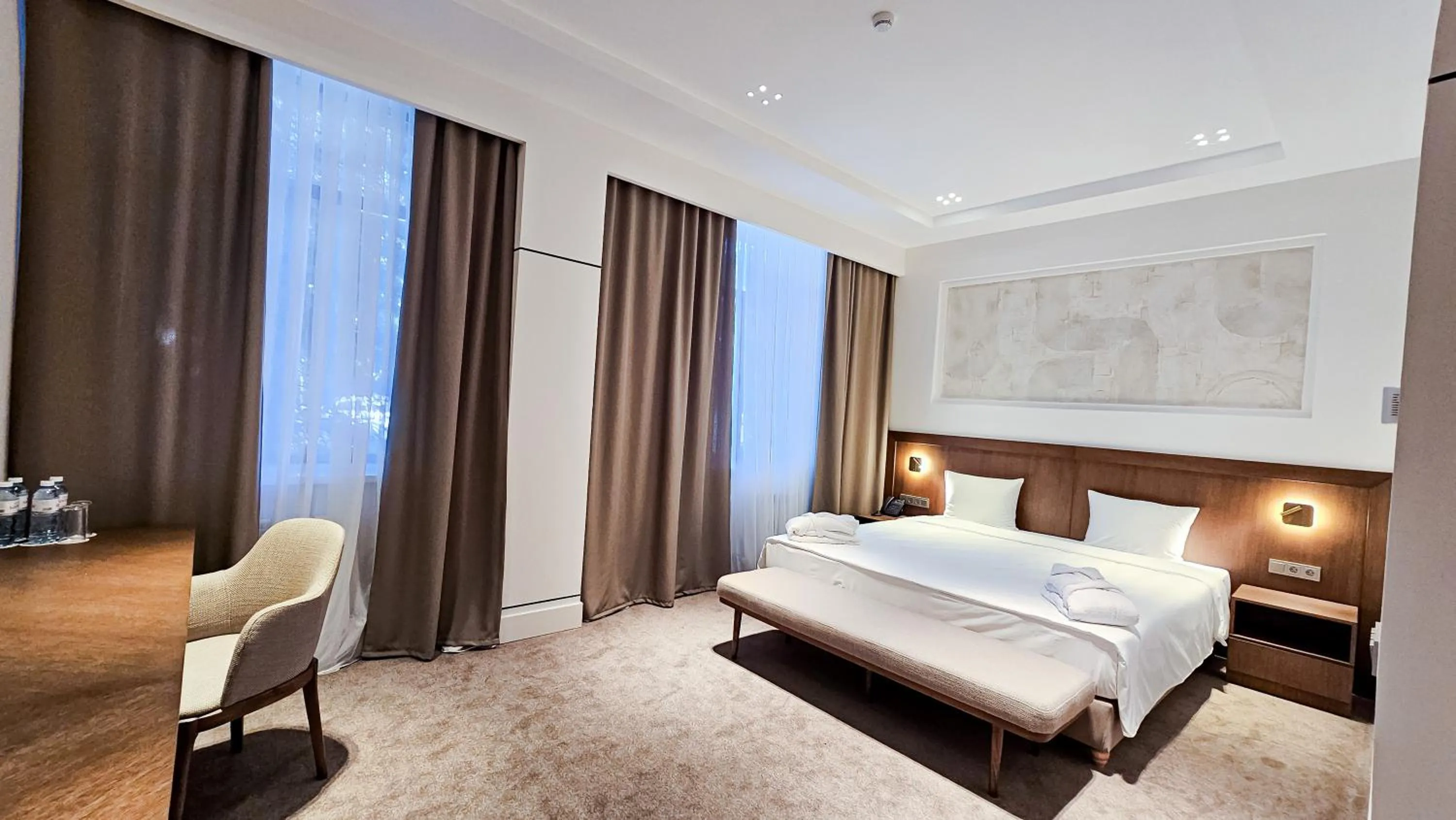 Bed in Grand Tien Shan Hotel