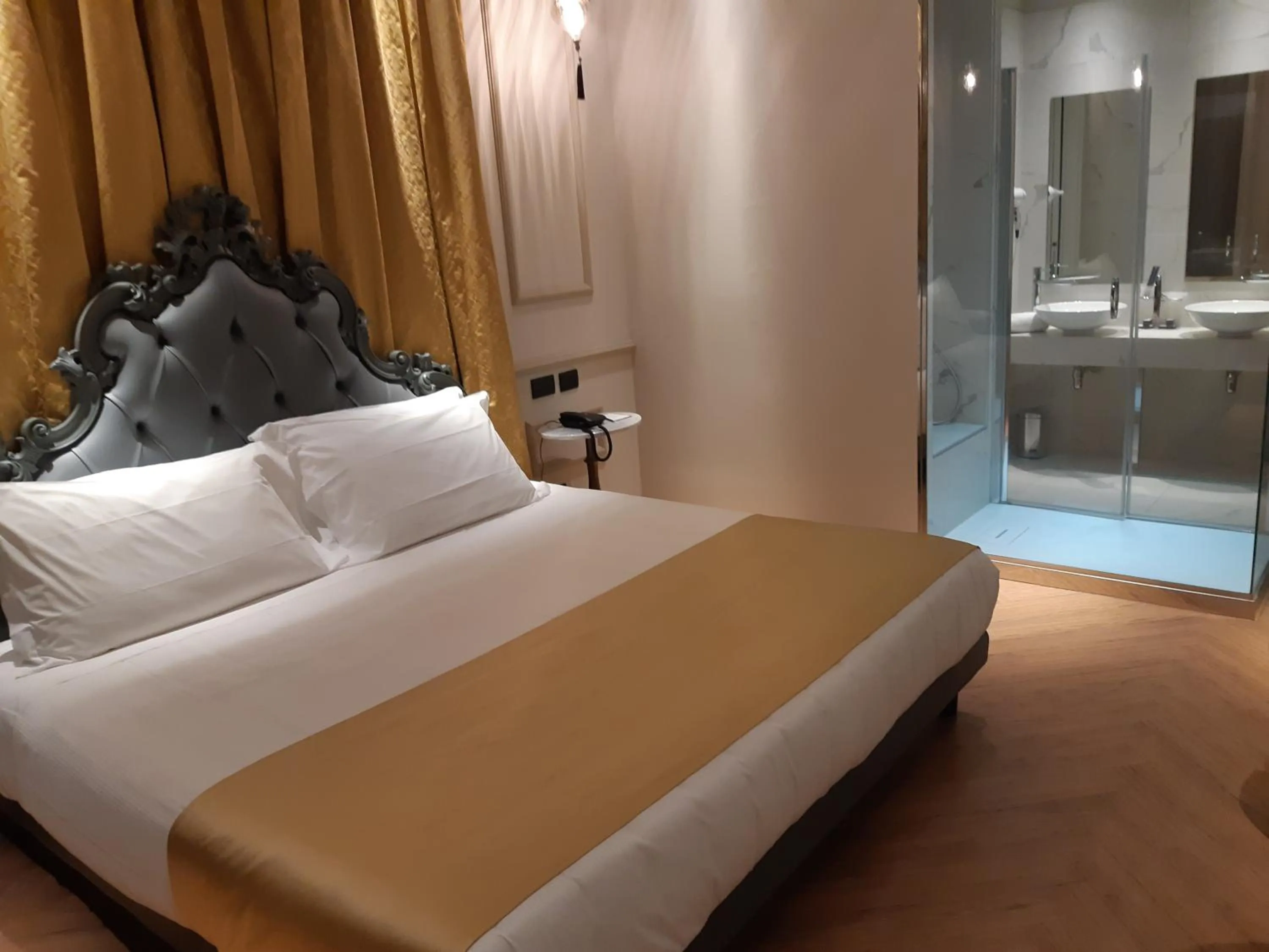 Bed in Emotional Grand Motel