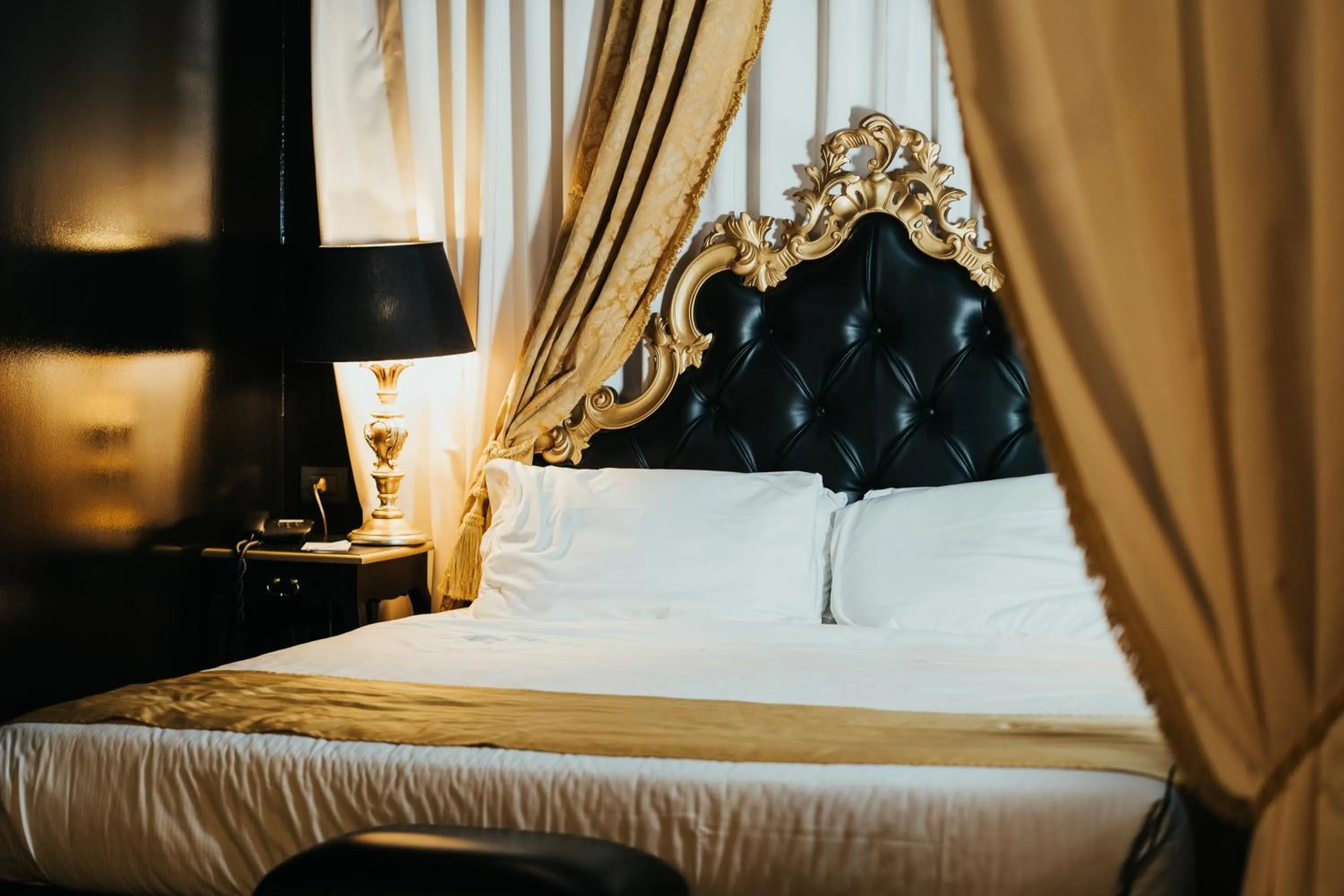 Bed in Emotional Grand Motel