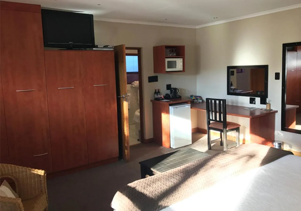 Bedroom in A La Martha's Air-Port Guest House