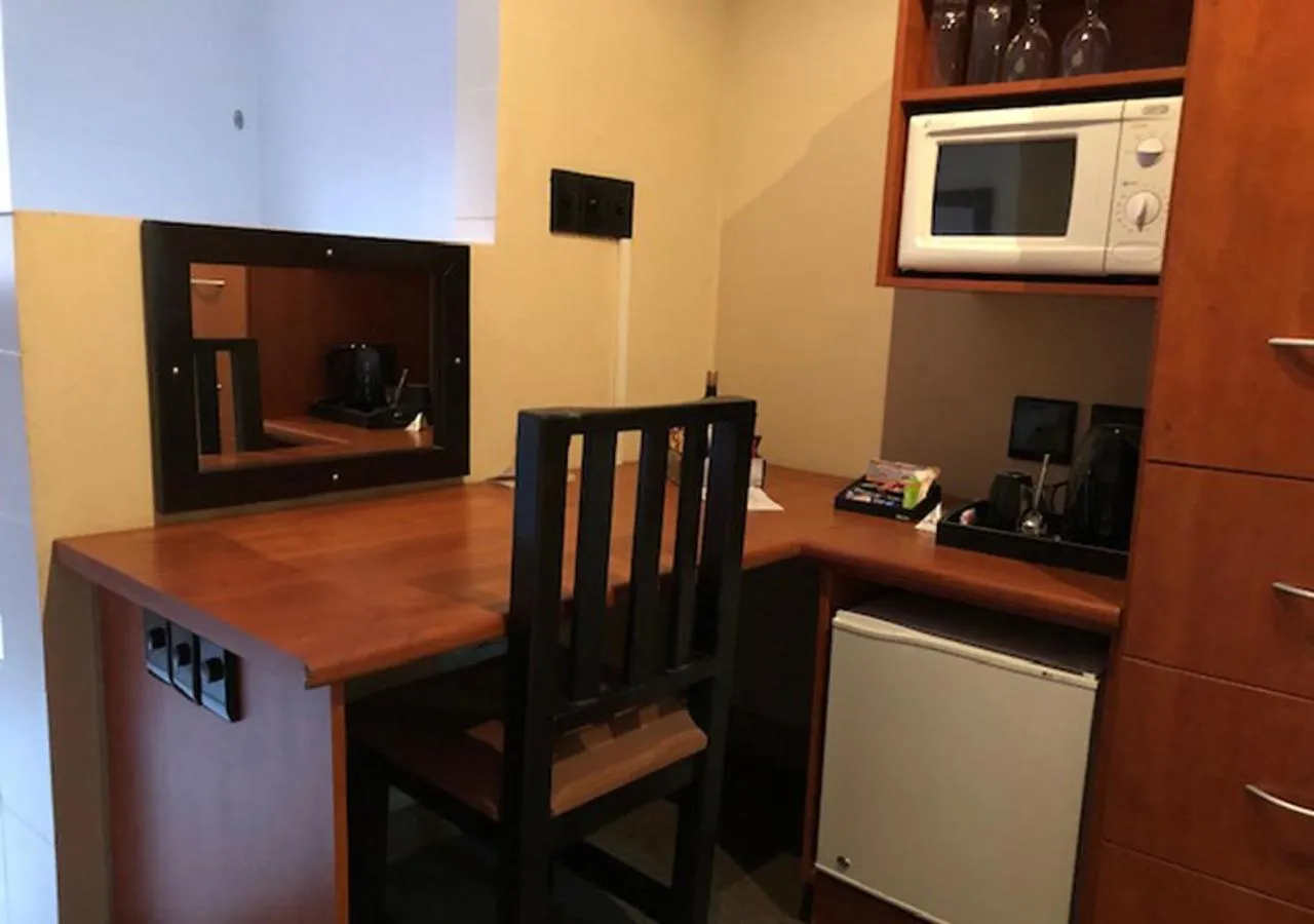 minibar in A La Martha's Air-Port Guest House