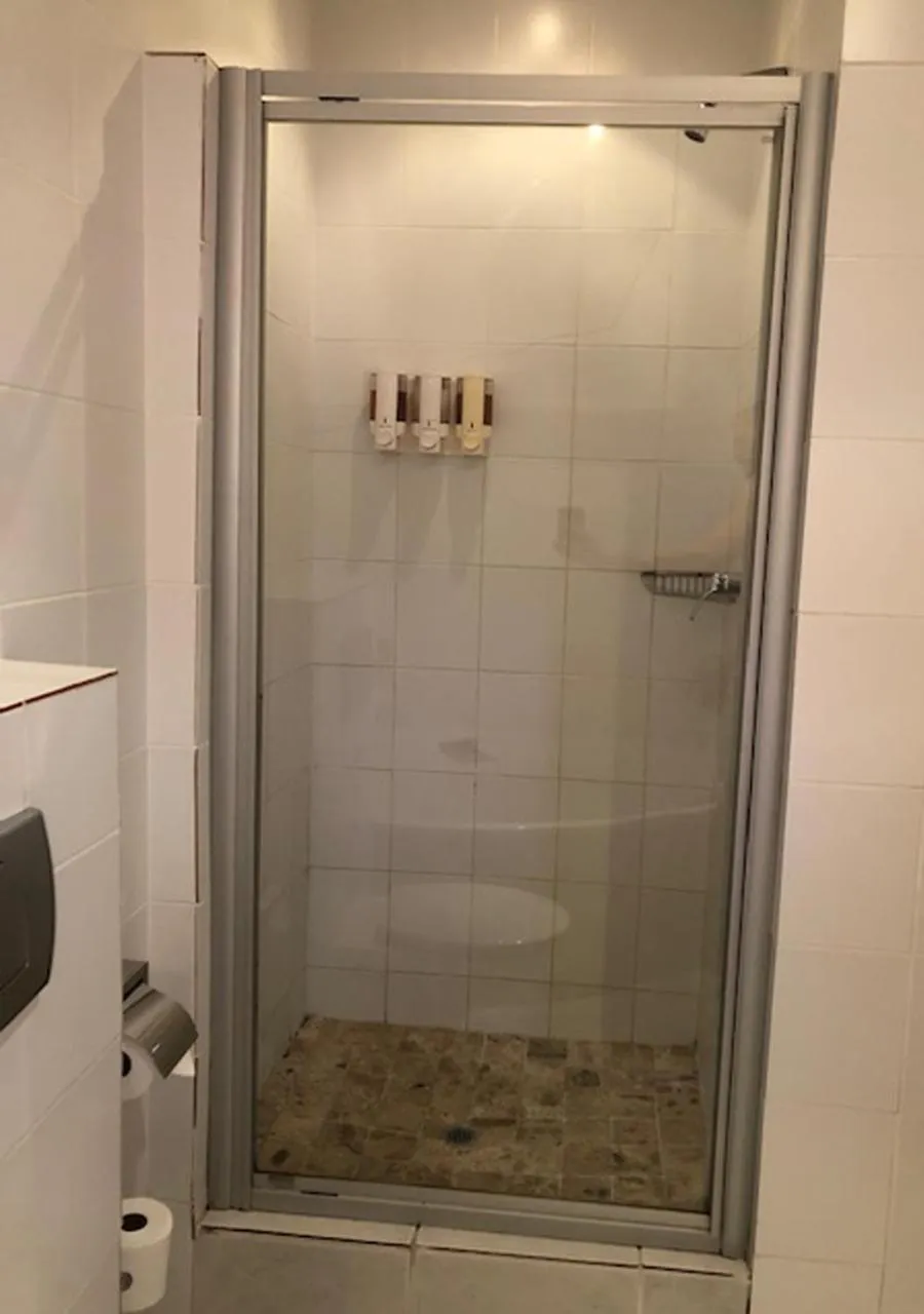 Shower in A La Martha's Air-Port Guest House