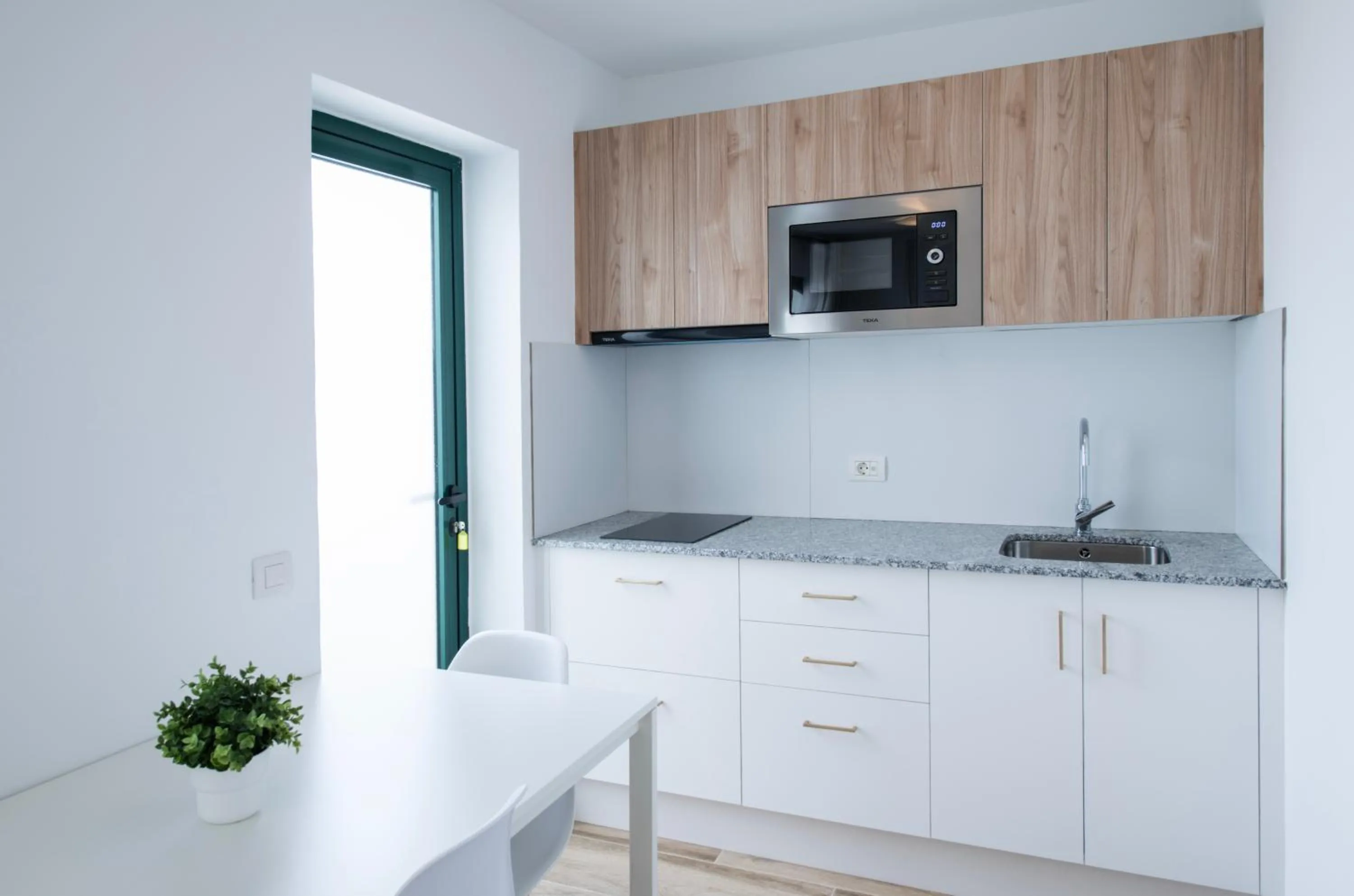 Kitchen or kitchenette in Apartamentos Los Rosales