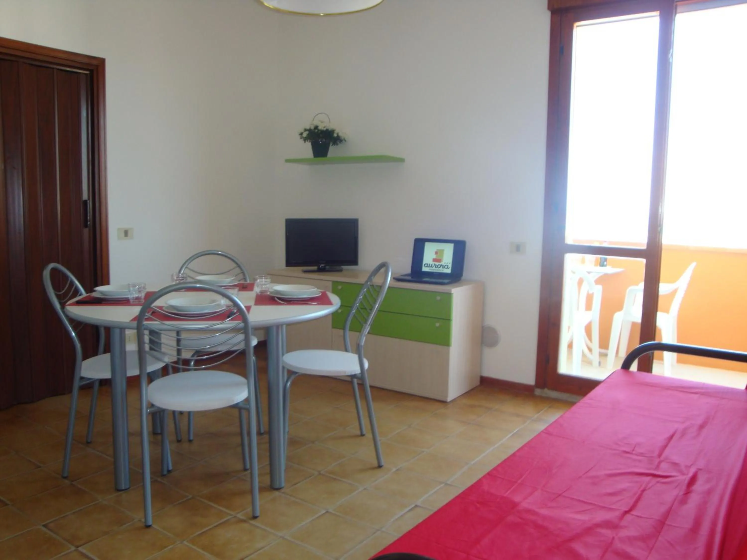 Dining area, Bed in Aurora Residence