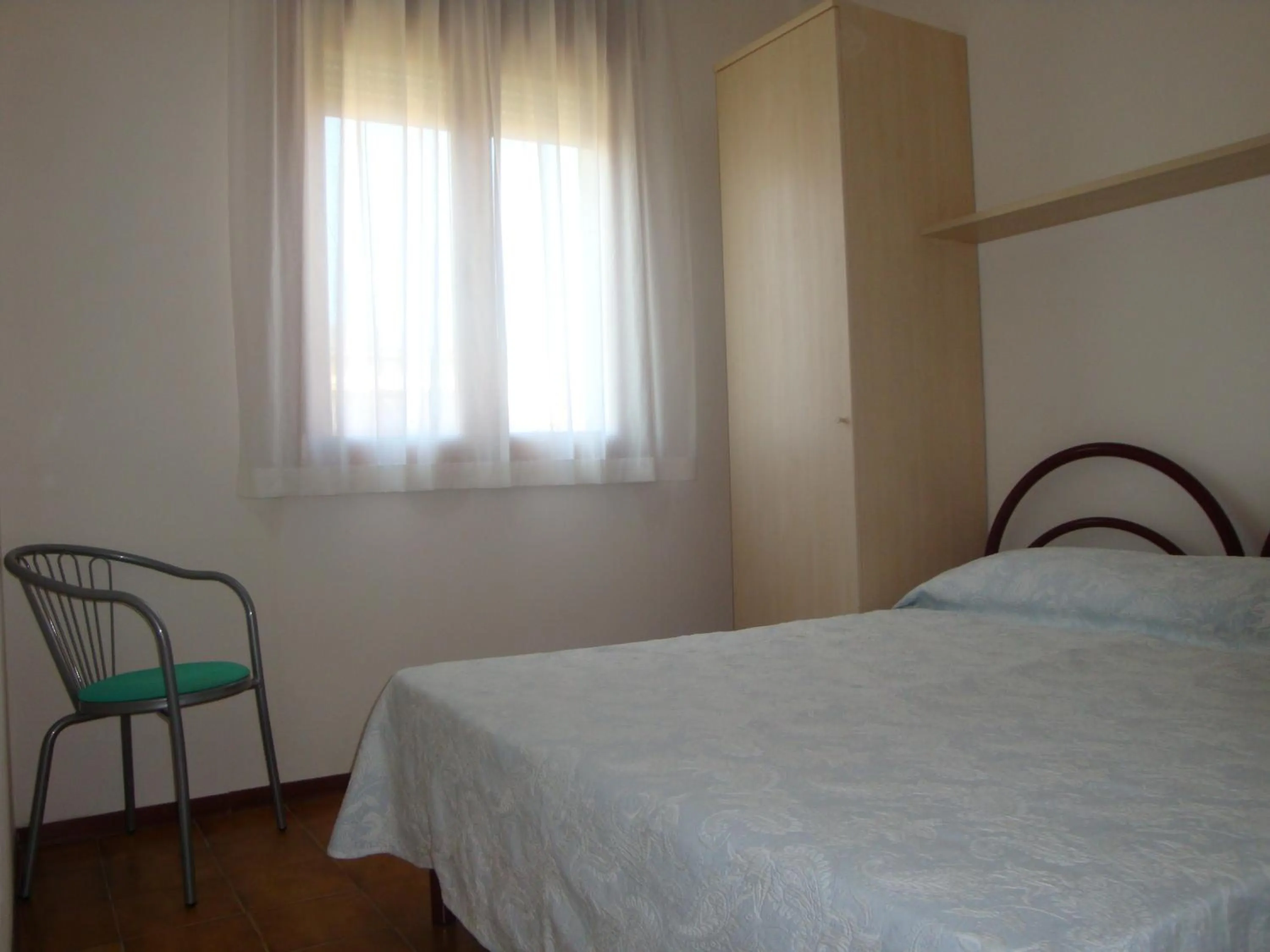 Bedroom, Bed in Aurora Residence