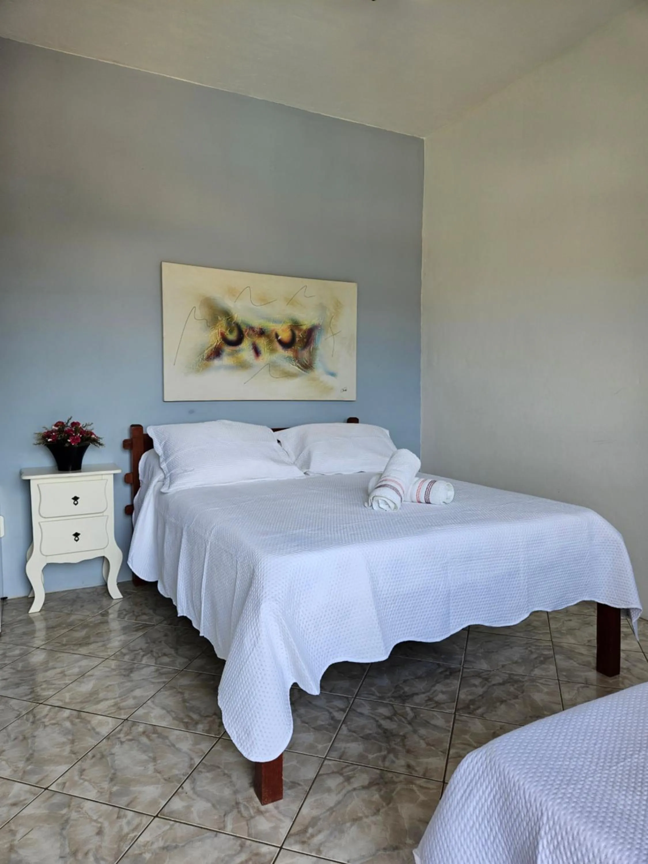 Bed in Pousada Recanto Das Emerências