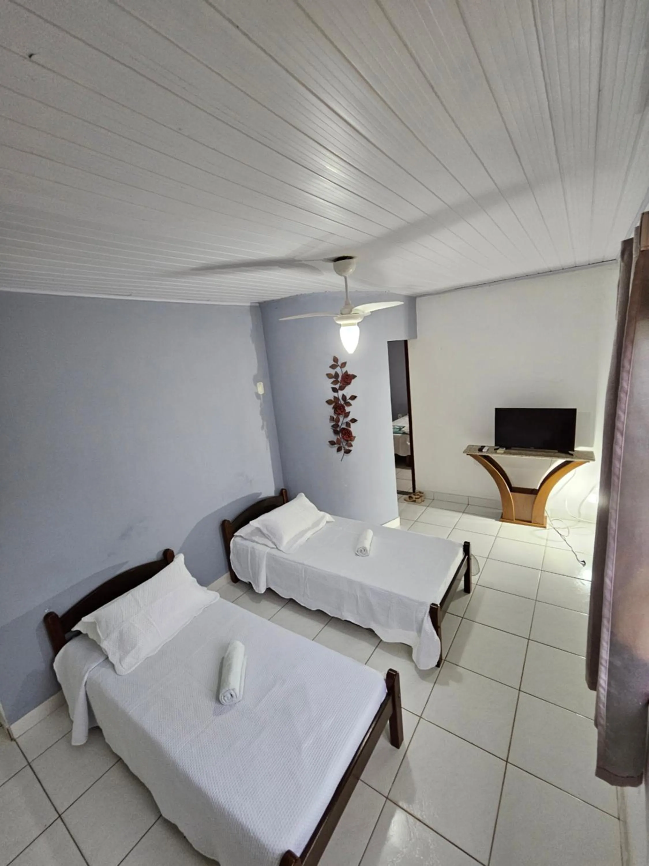 Bed in Pousada Recanto Das Emerências