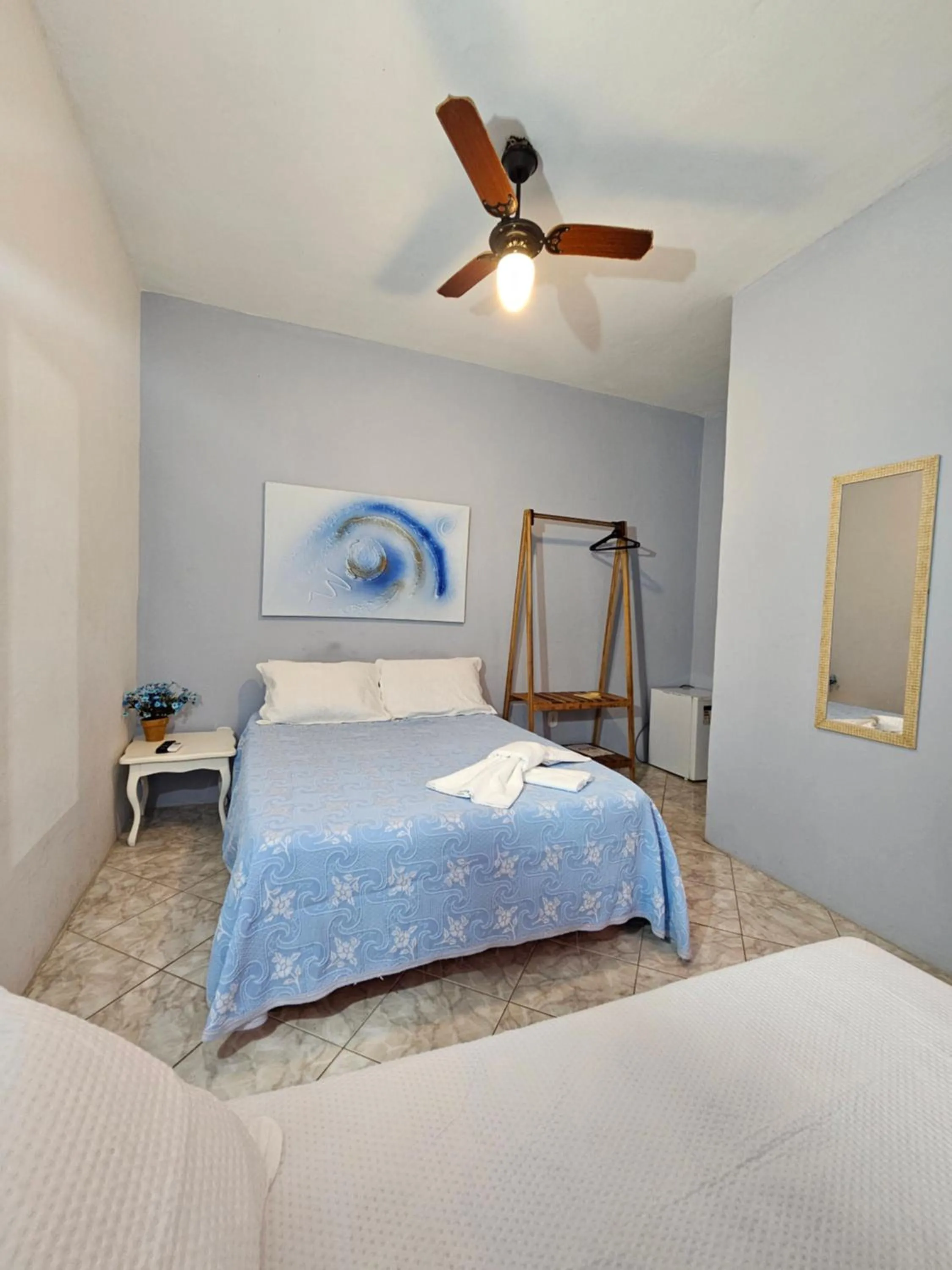 Bed in Pousada Recanto Das Emerências