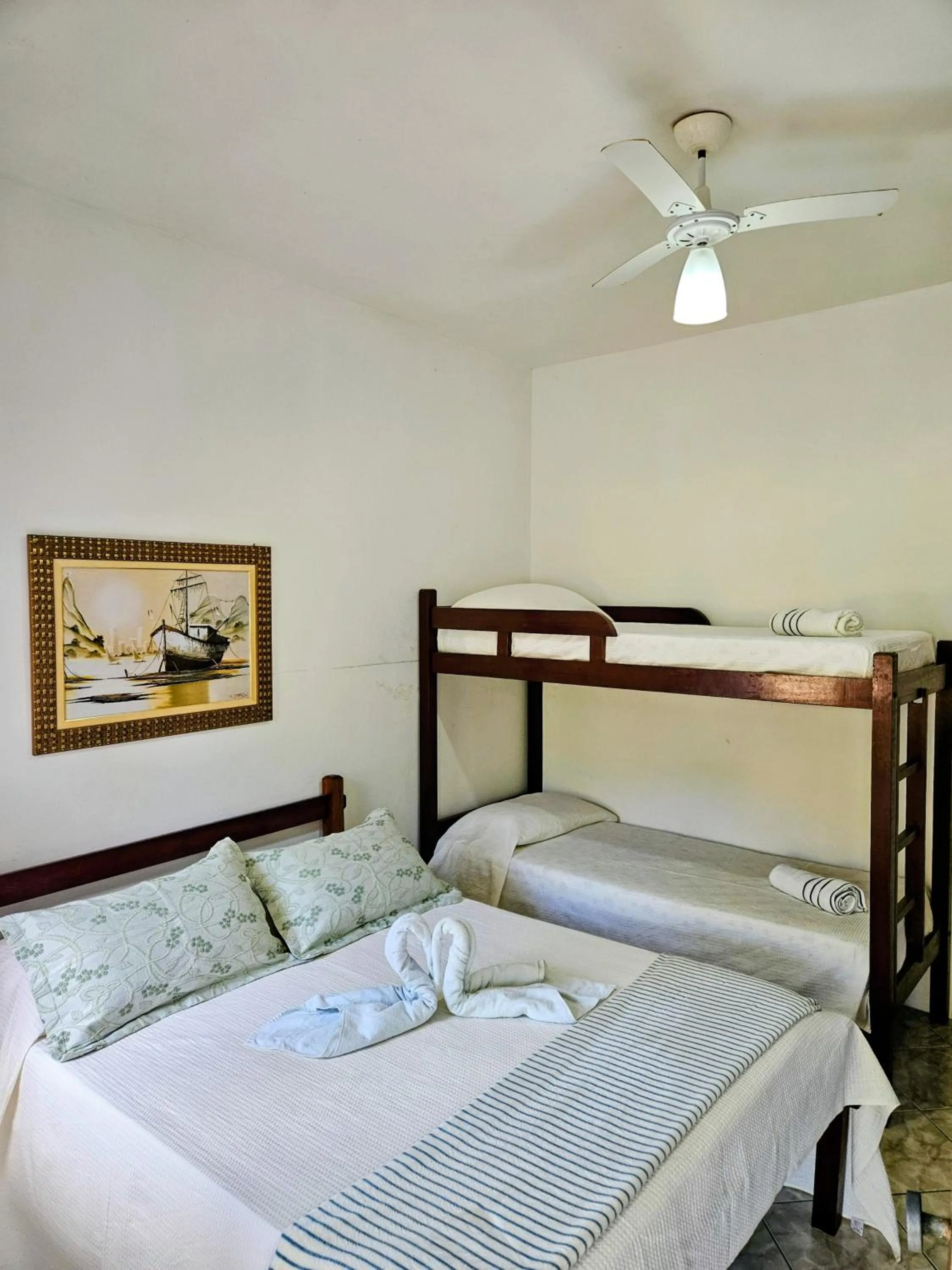 Bed in Pousada Recanto Das Emerências