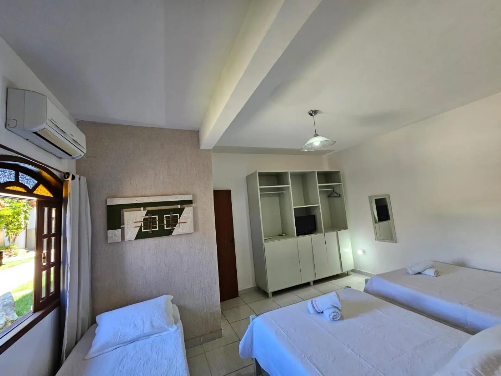 Bed in Pousada Recanto Das Emerências