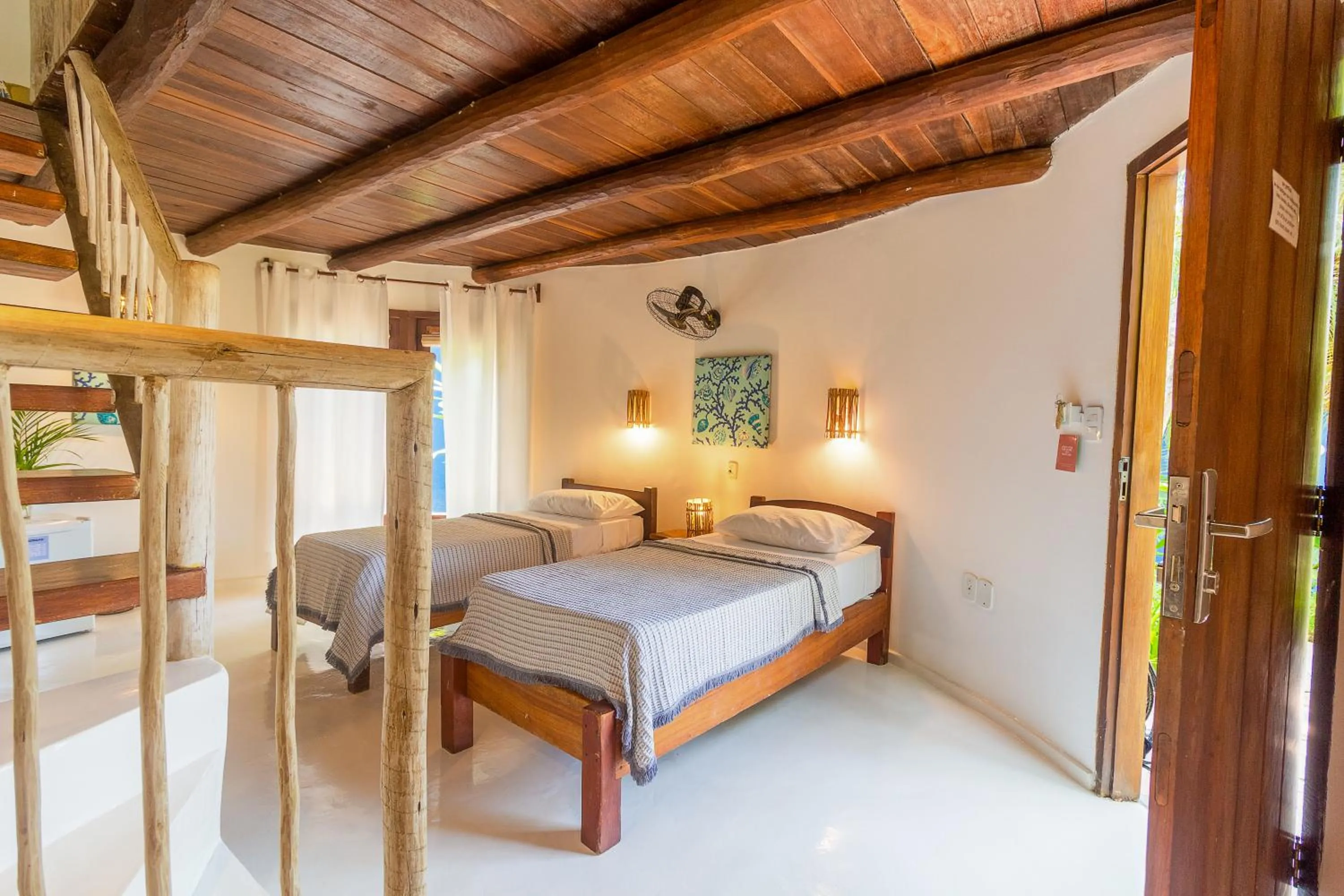 Bed in Pousada Jacarandá