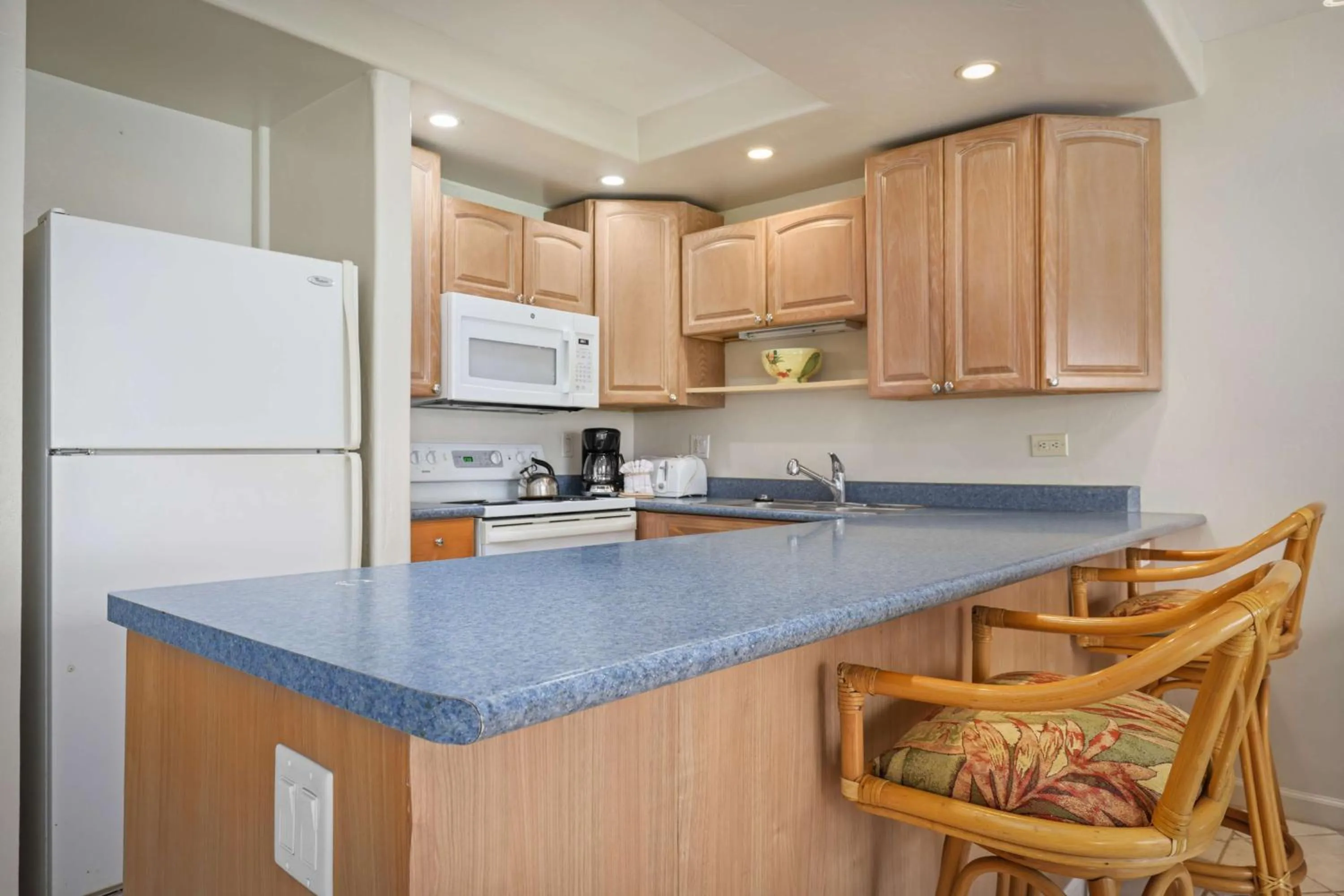 Kitchen or kitchenette in Aston at Papakea Resort