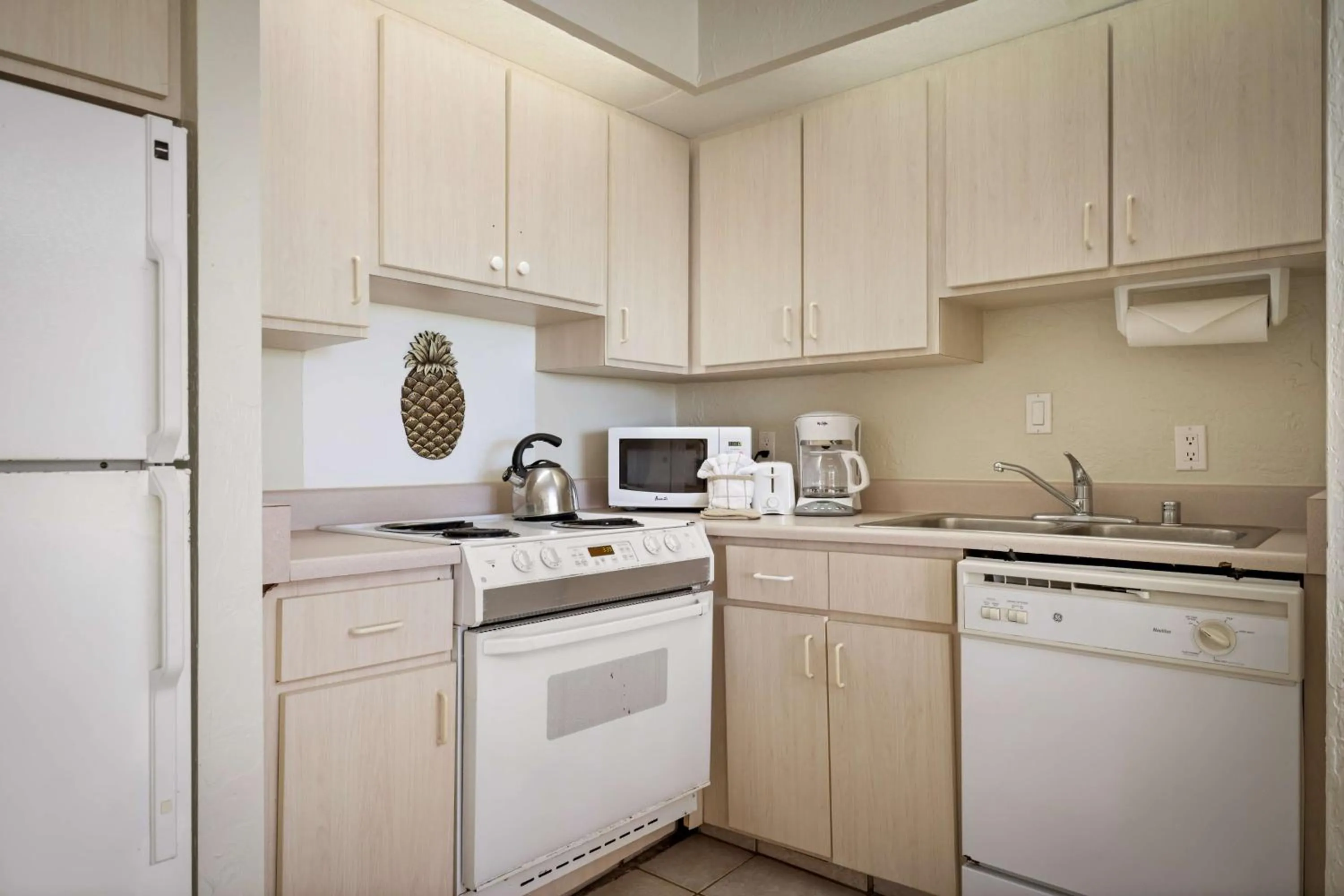 Kitchen or kitchenette in Aston at Papakea Resort