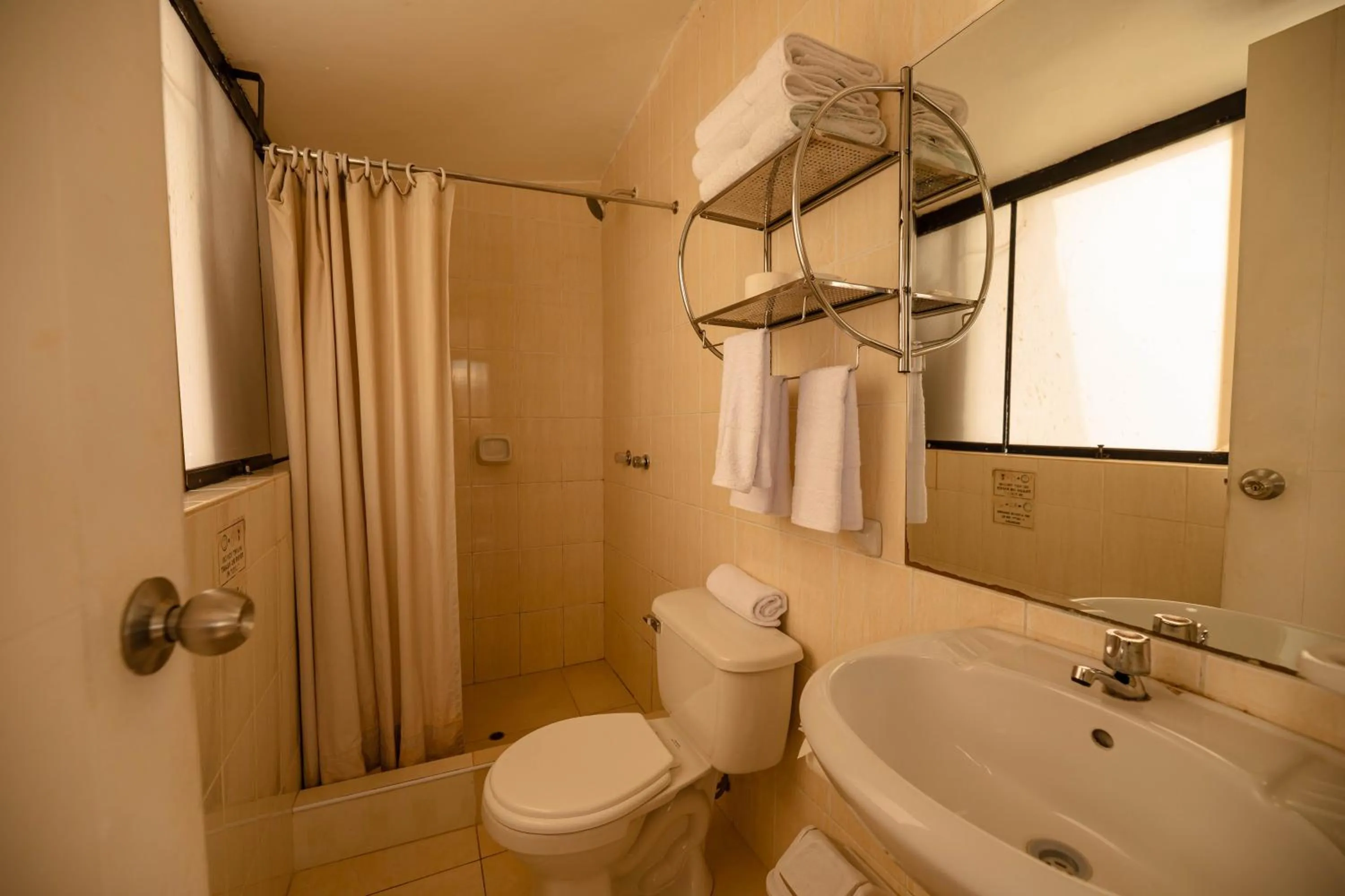 Shower in Mayu Boutique Hotel