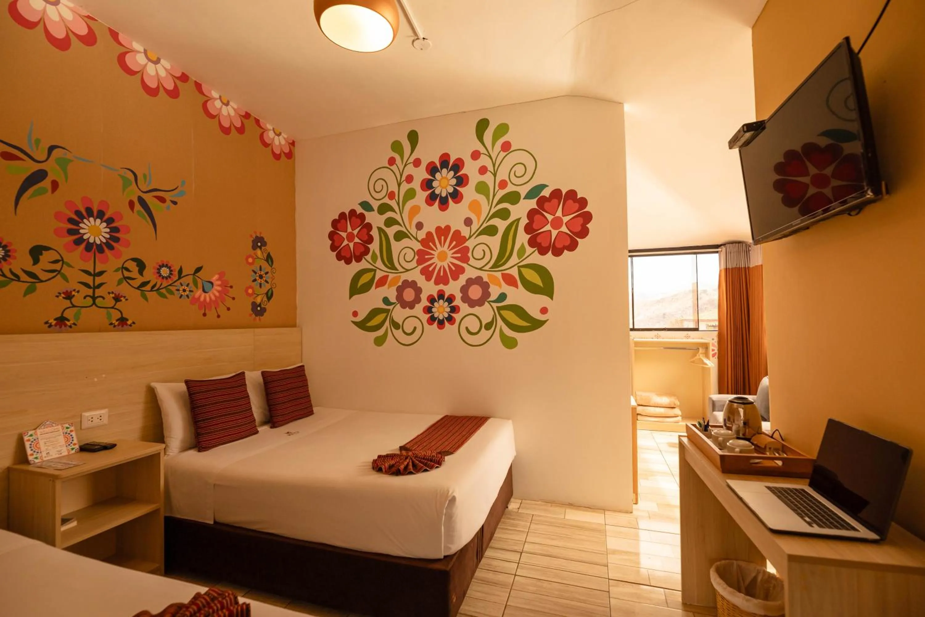 Bed in Mayu Boutique Hotel