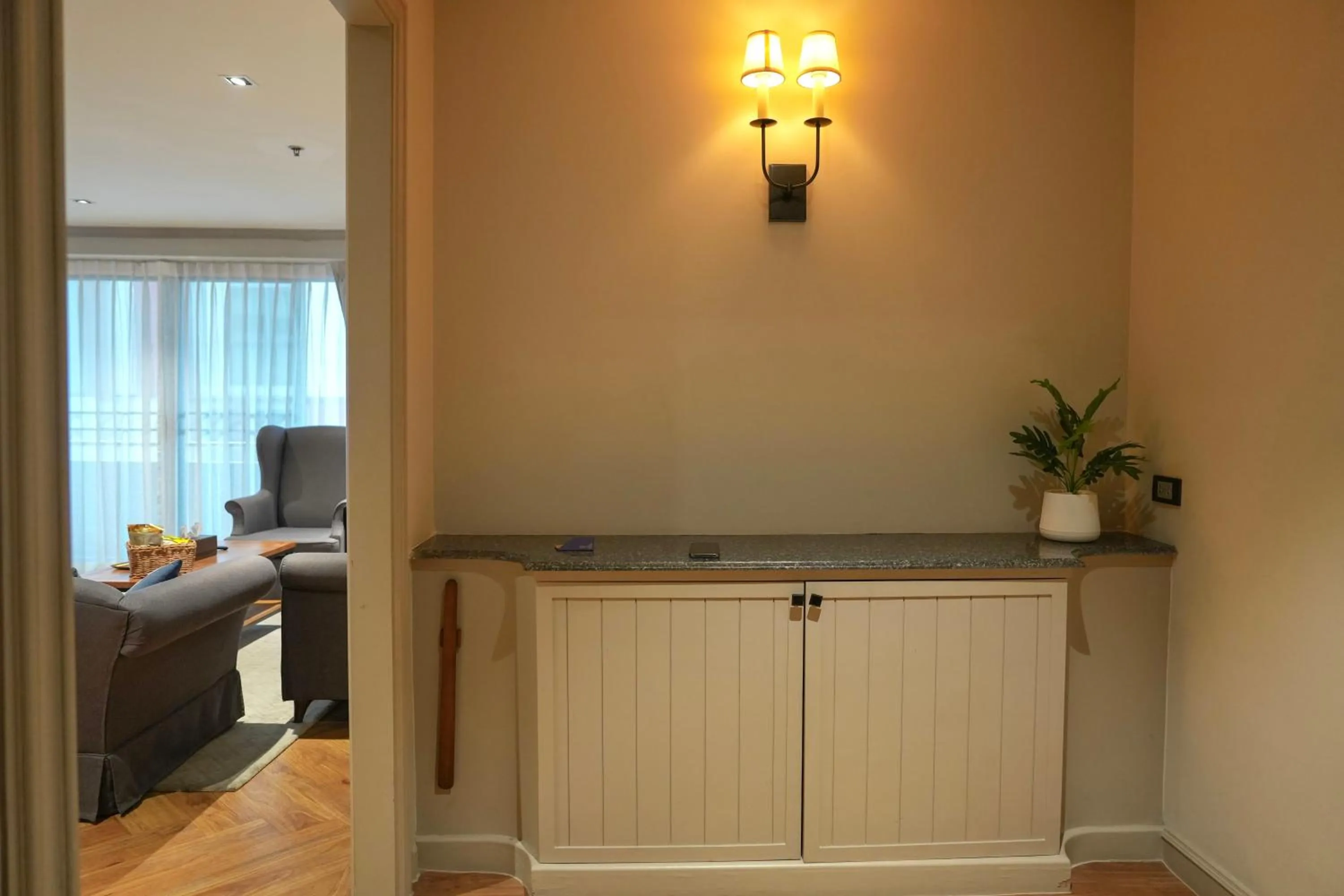 Living room, Bed in THEA Private Suites by TH District